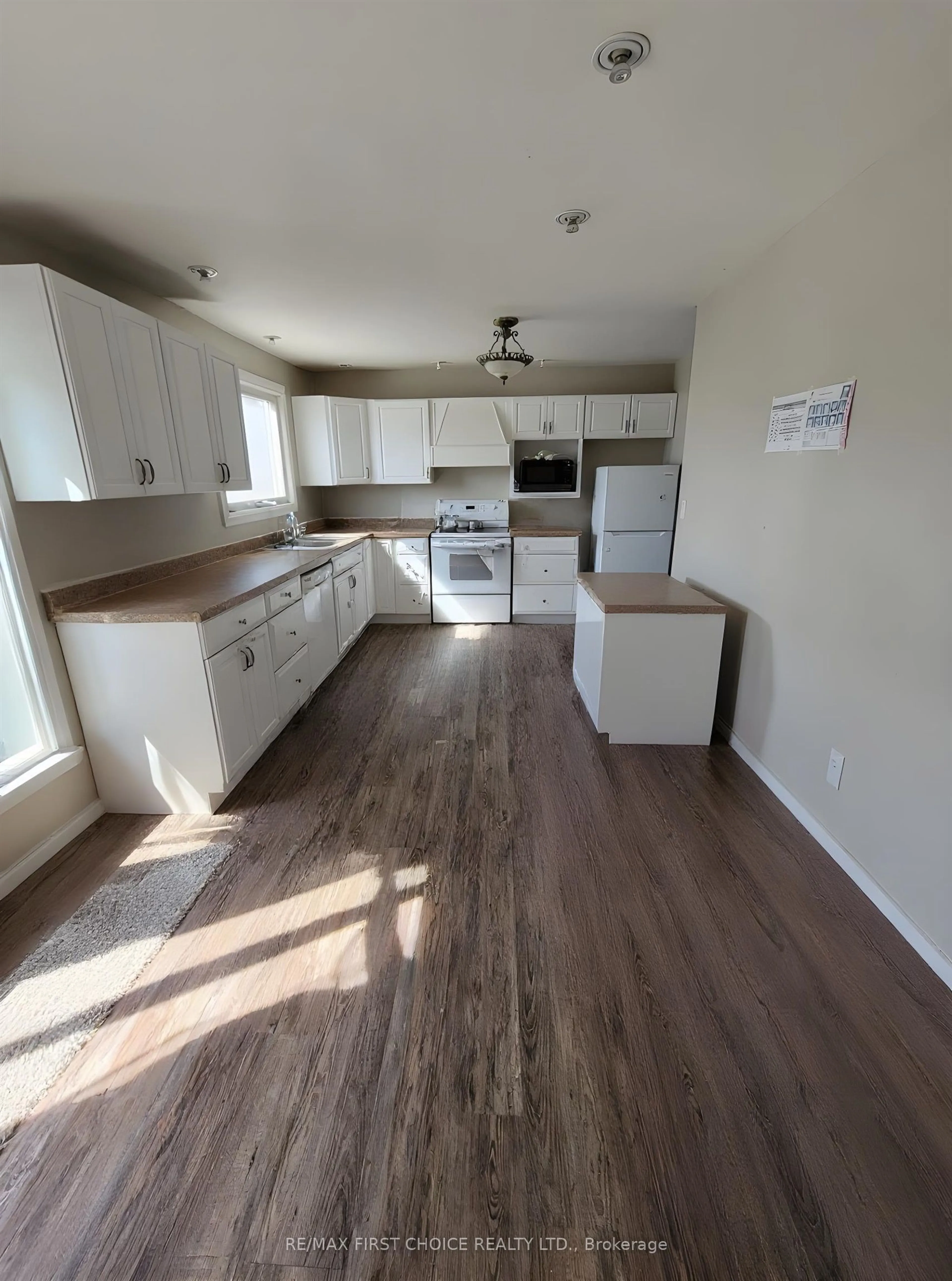 Open concept kitchen, wood/laminate floor for 1208 Olde Shambles Rd, Fort Frances Ontario P9A 3S7