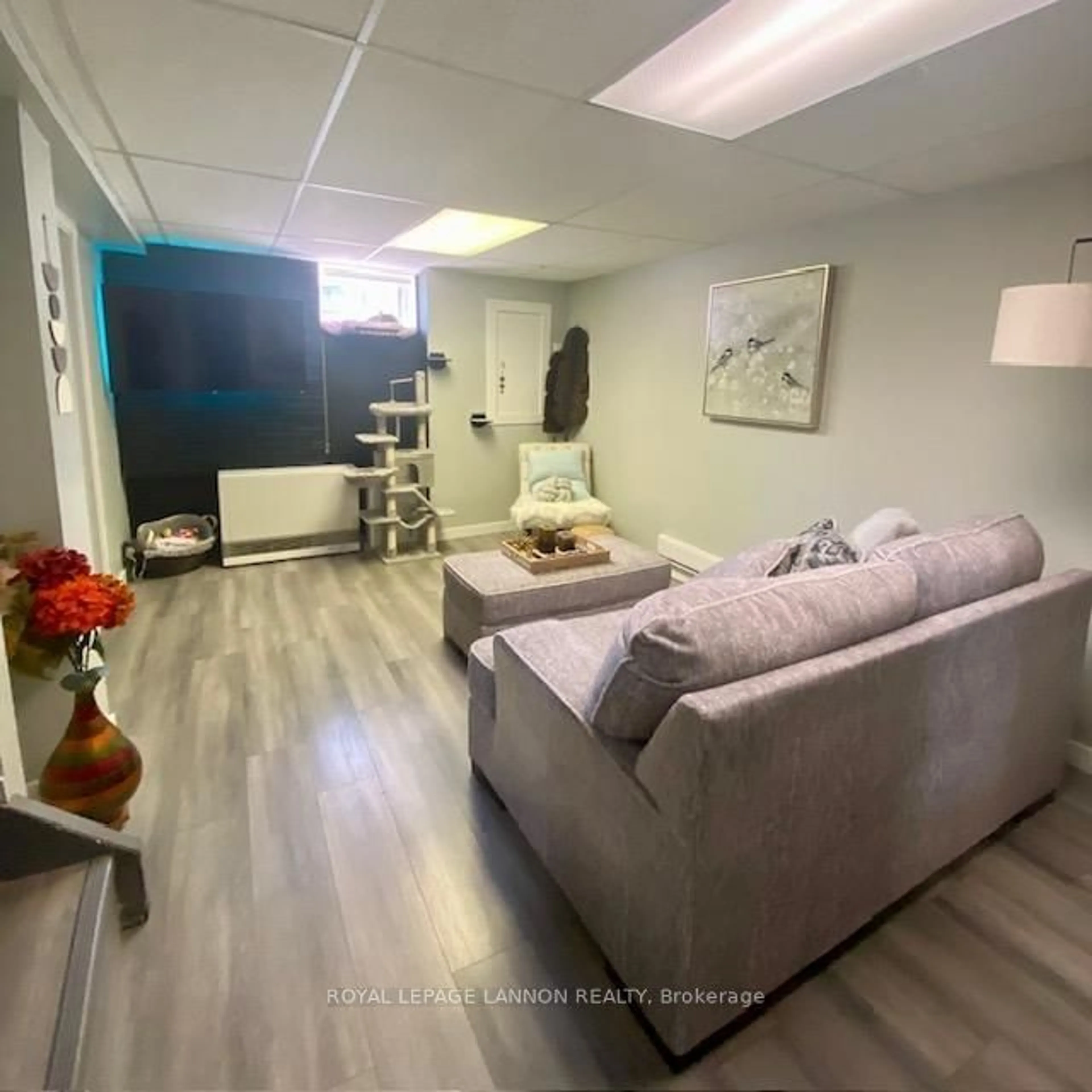 Living room with furniture, wood/laminate floor for 611 Daneff Cres, Greenstone Ontario P0T 1M0