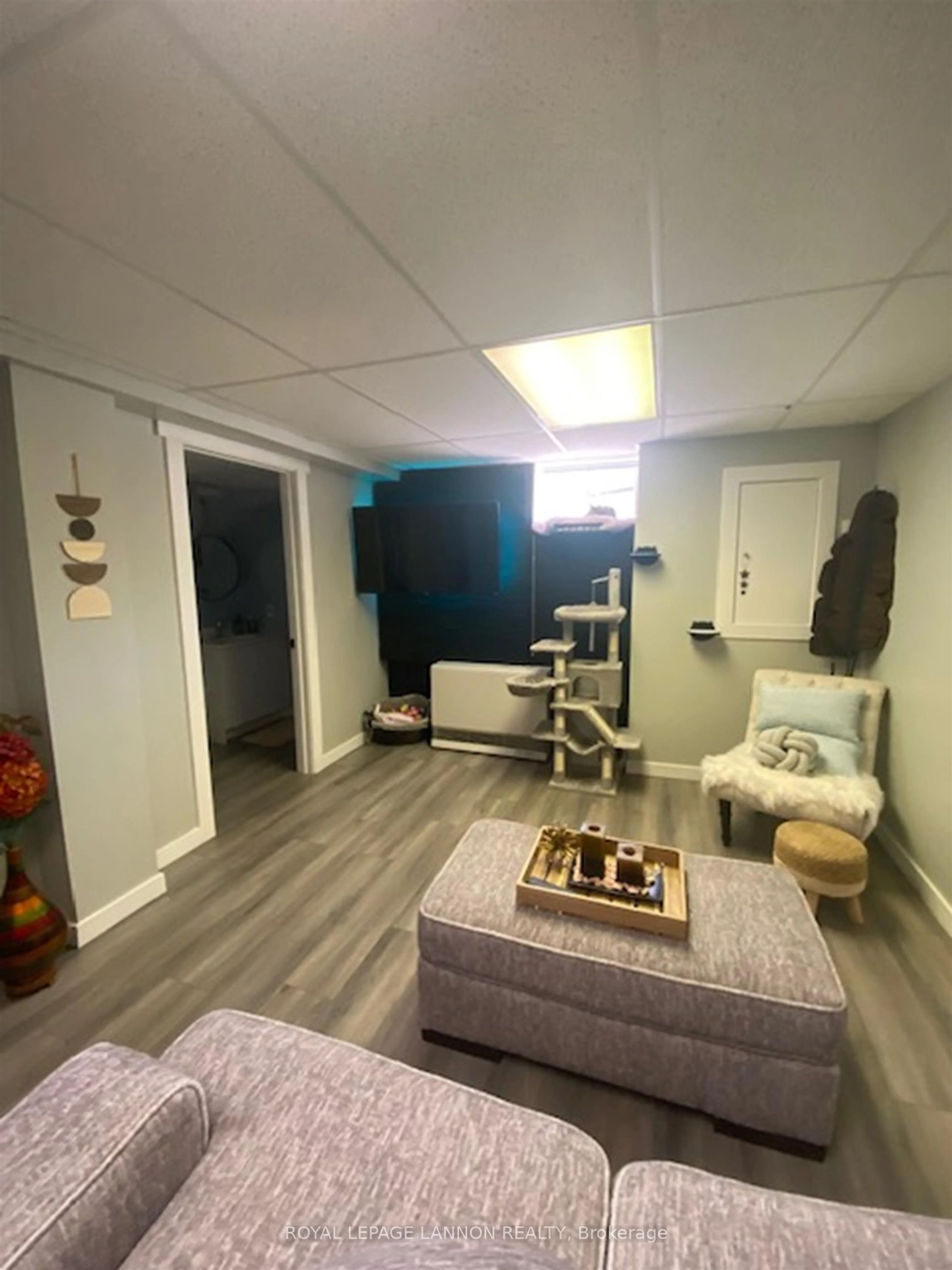 Living room with furniture, wood/laminate floor for 611 Daneff Cres, Greenstone Ontario P0T 1M0