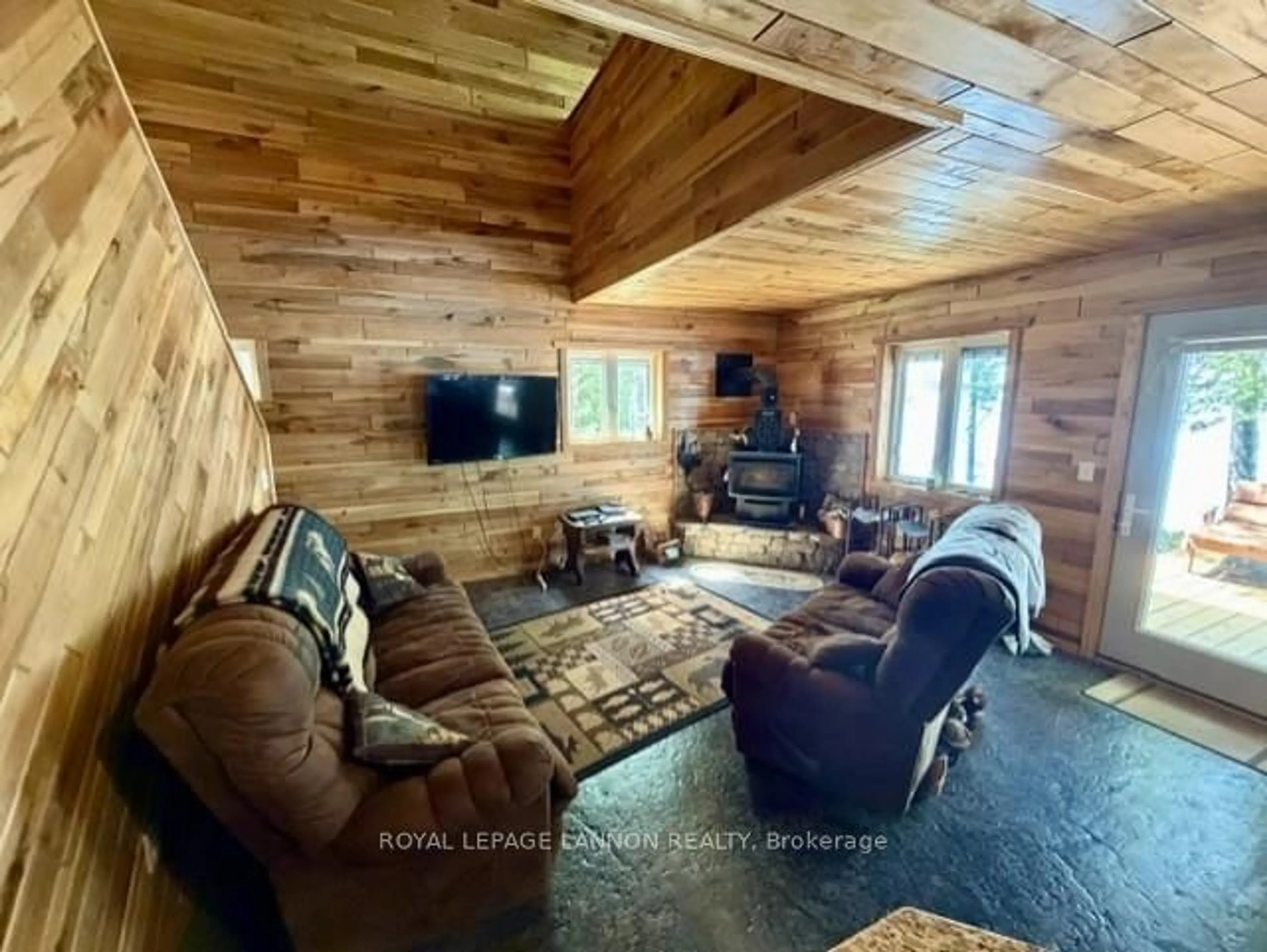 Living room with furniture, wood/laminate floor for 16 MANIWAKI Lane, Thunder Bay Remote Area Ontario P0T 2Y0