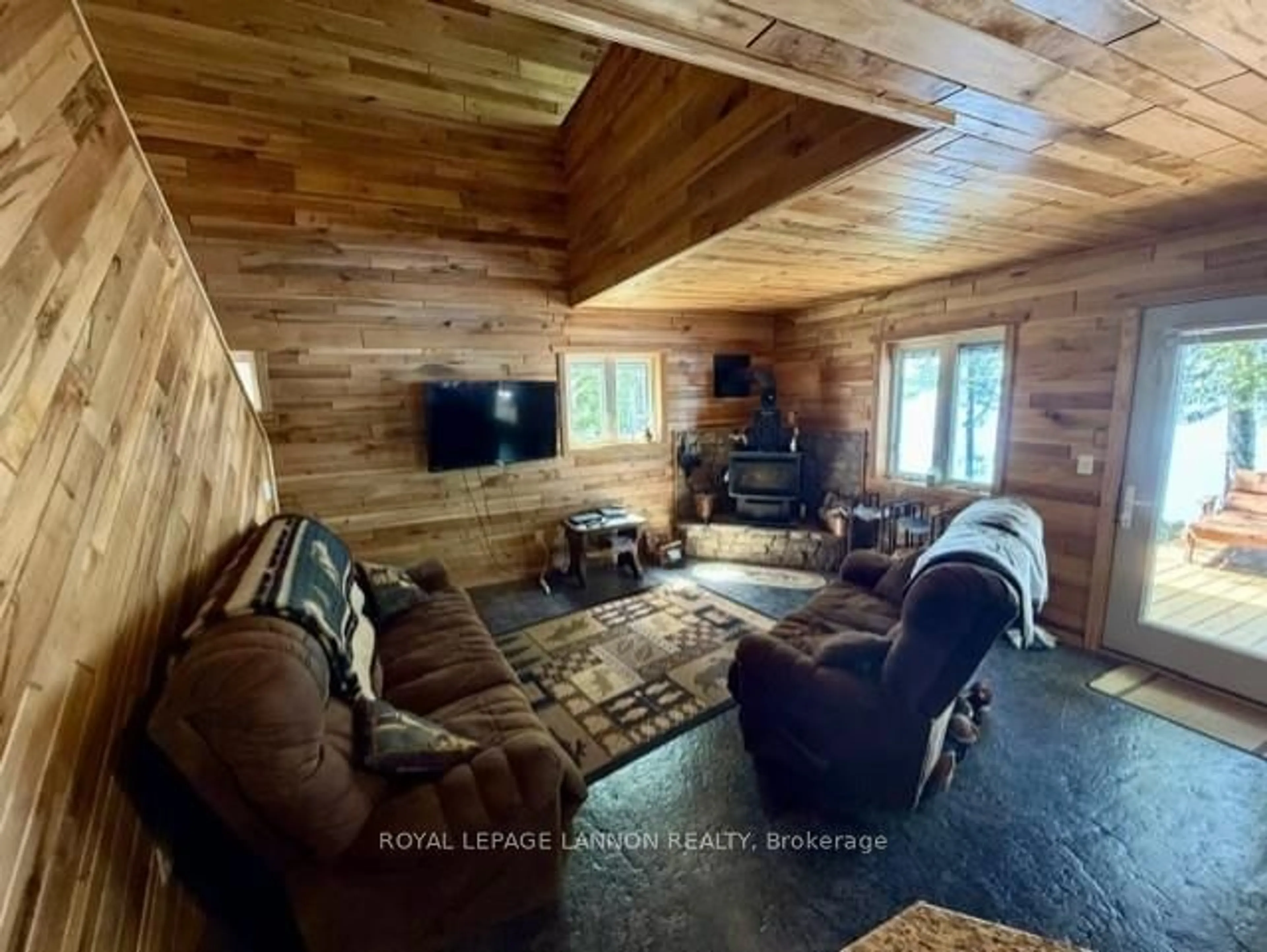 Living room with furniture, wood/laminate floor for 16 MANIWAKI Lane, Thunder Bay Remote Area Ontario P0T 2Y0