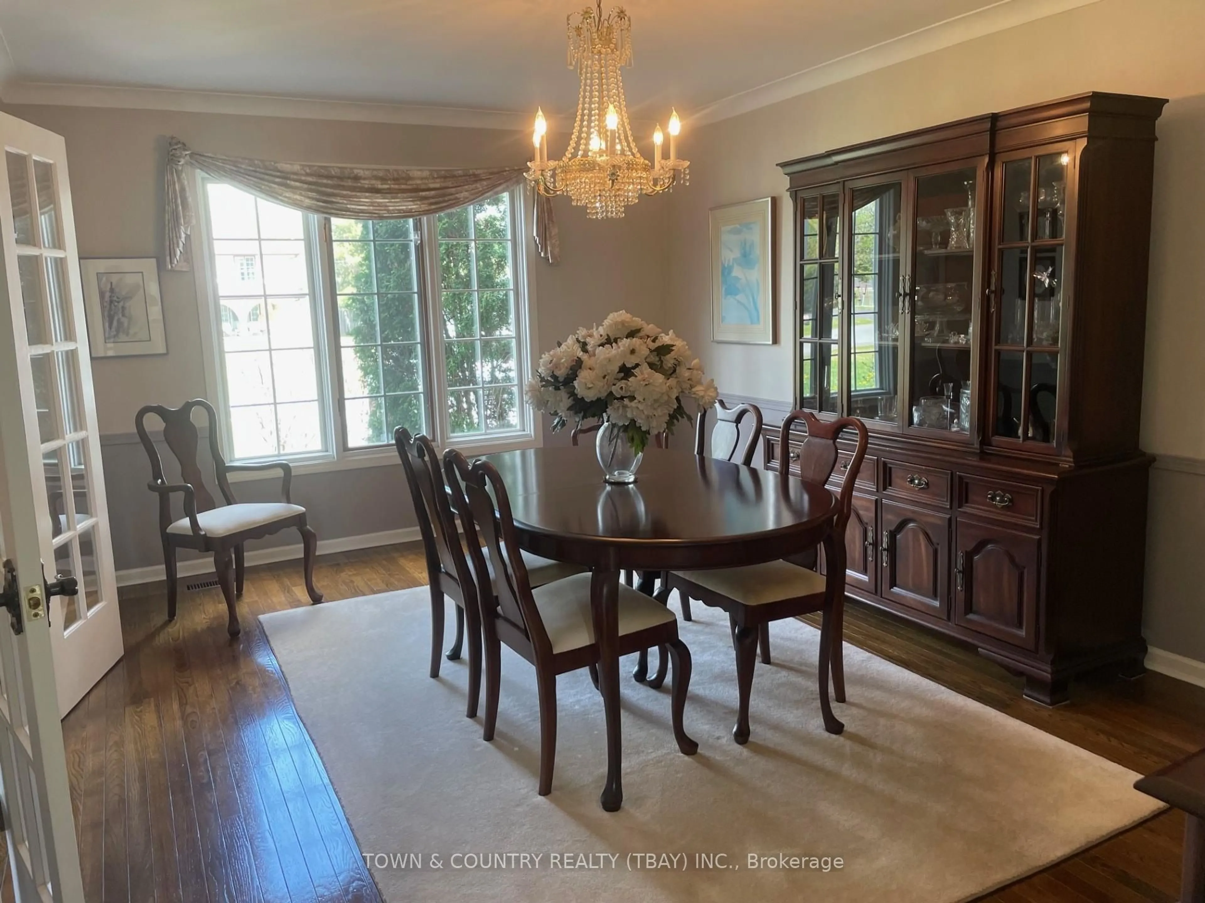 Dining room, wood/laminate floor for 106 Herrick Pl, Thunder Bay Ontario P7K 1C6
