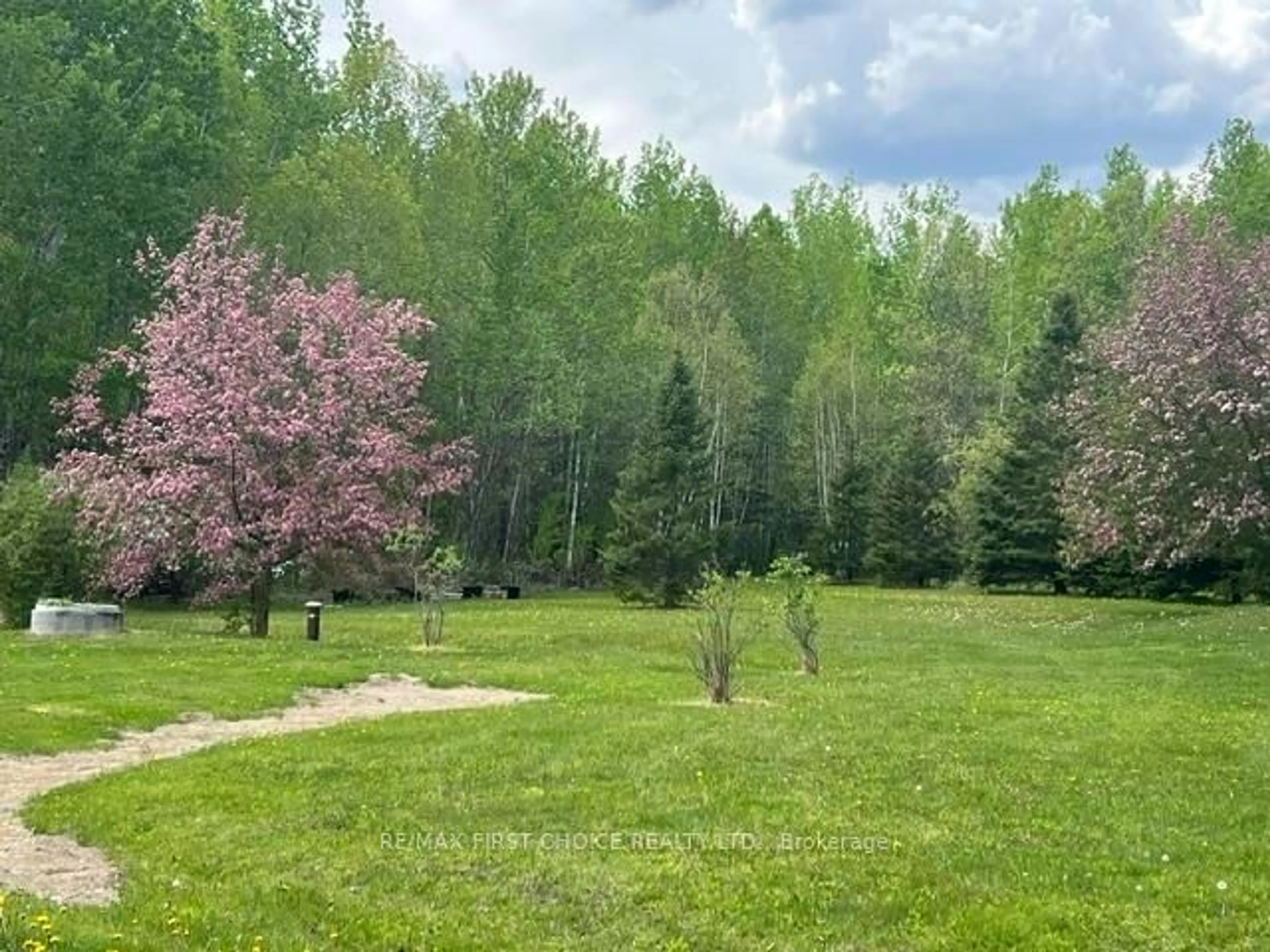 A pic from outside/outdoor area/front of a property/back of a property/a pic from drone, forest/trees view for 143 McTavish Rd, La Vallee Ontario P0W 1C0