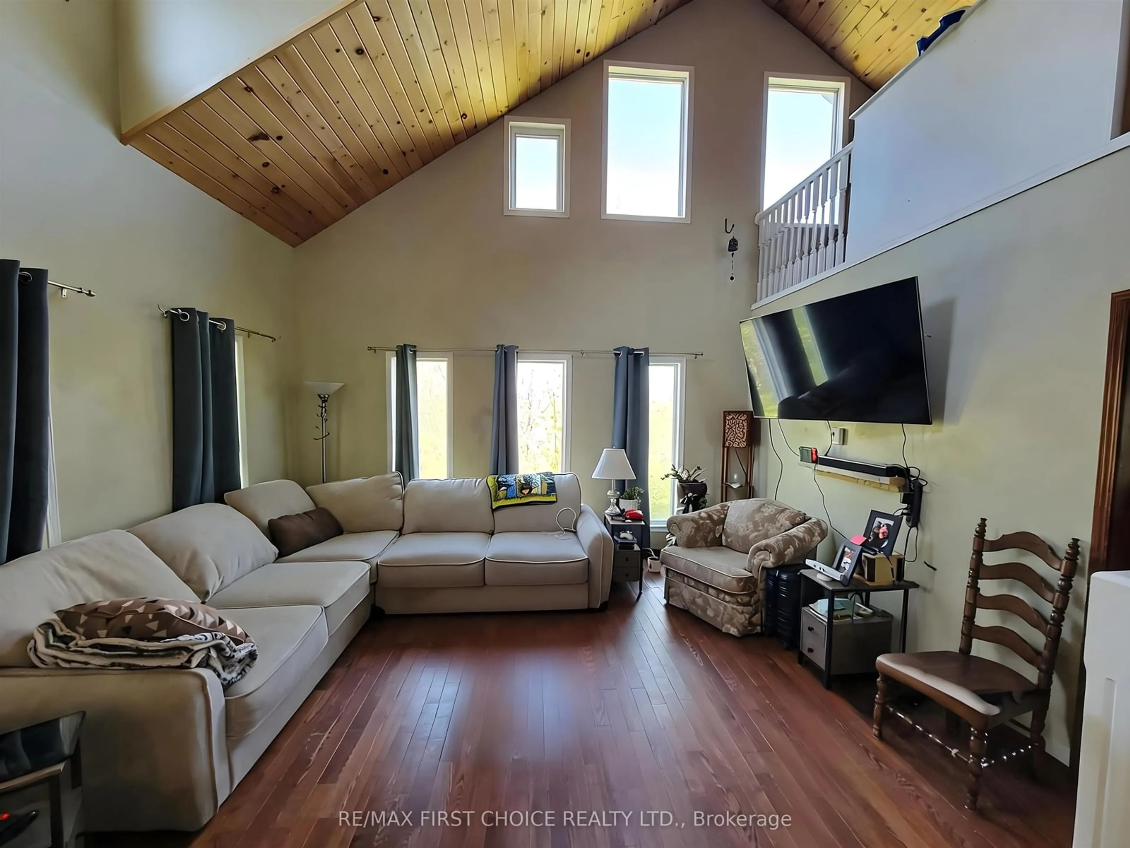 Living room with furniture, wood/laminate floor for 285 Sundwall Rd, Morley Ontario P0W 1N0