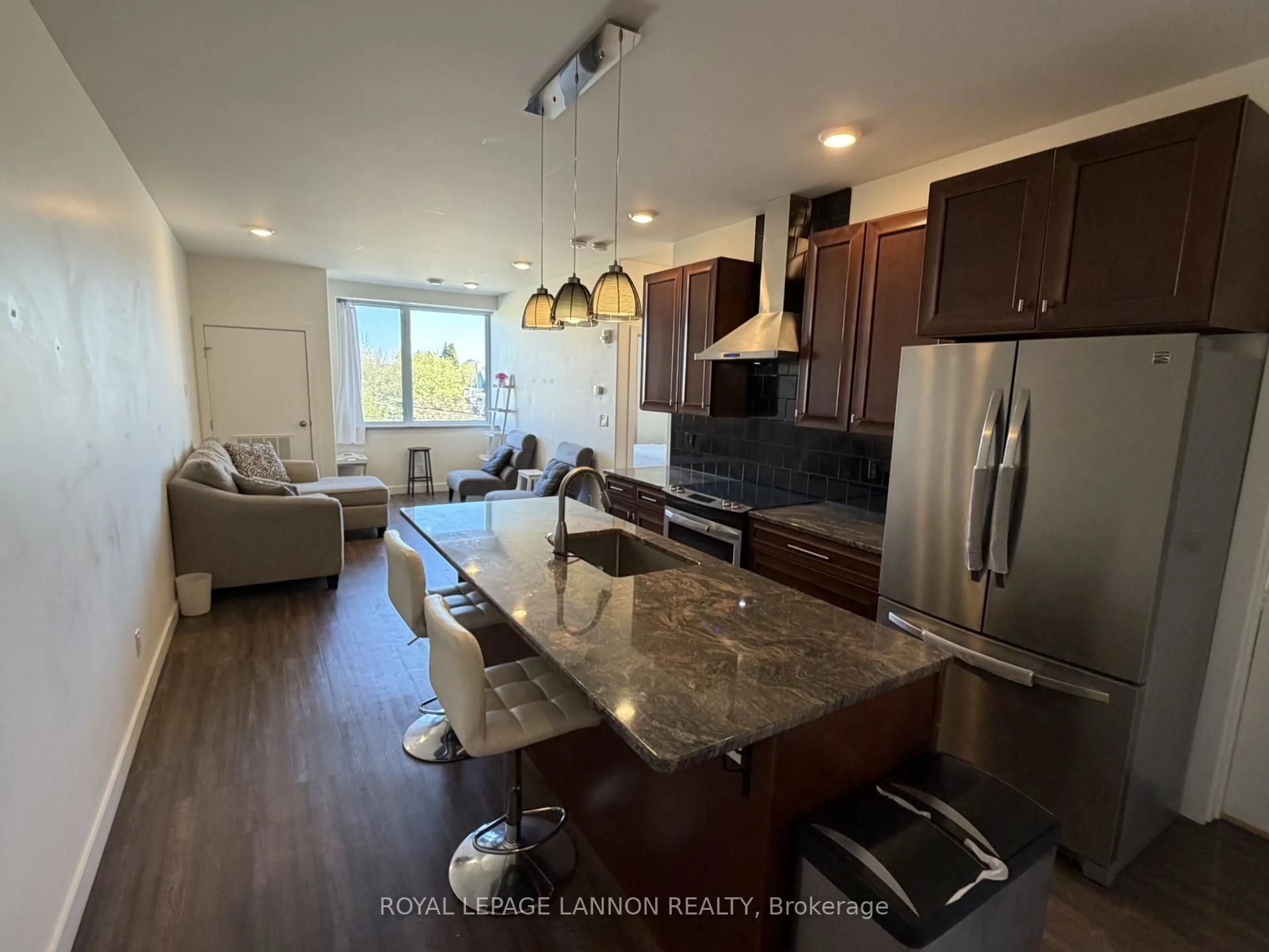 Open concept kitchen, wood/laminate floor for 96 HIGH St, Thunder Bay Ontario P7A 5R3