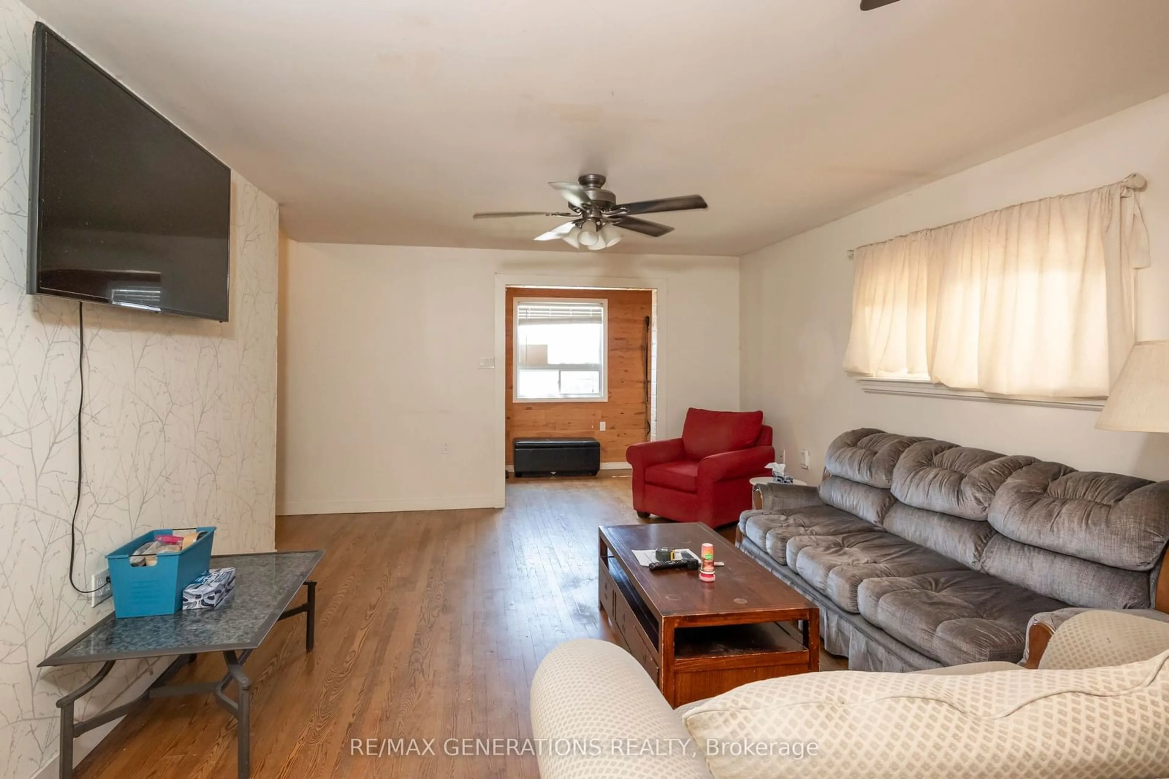 Living room with furniture, wood/laminate floor for 115 Finlayson St, Thunder Bay Ontario P7C 2K5