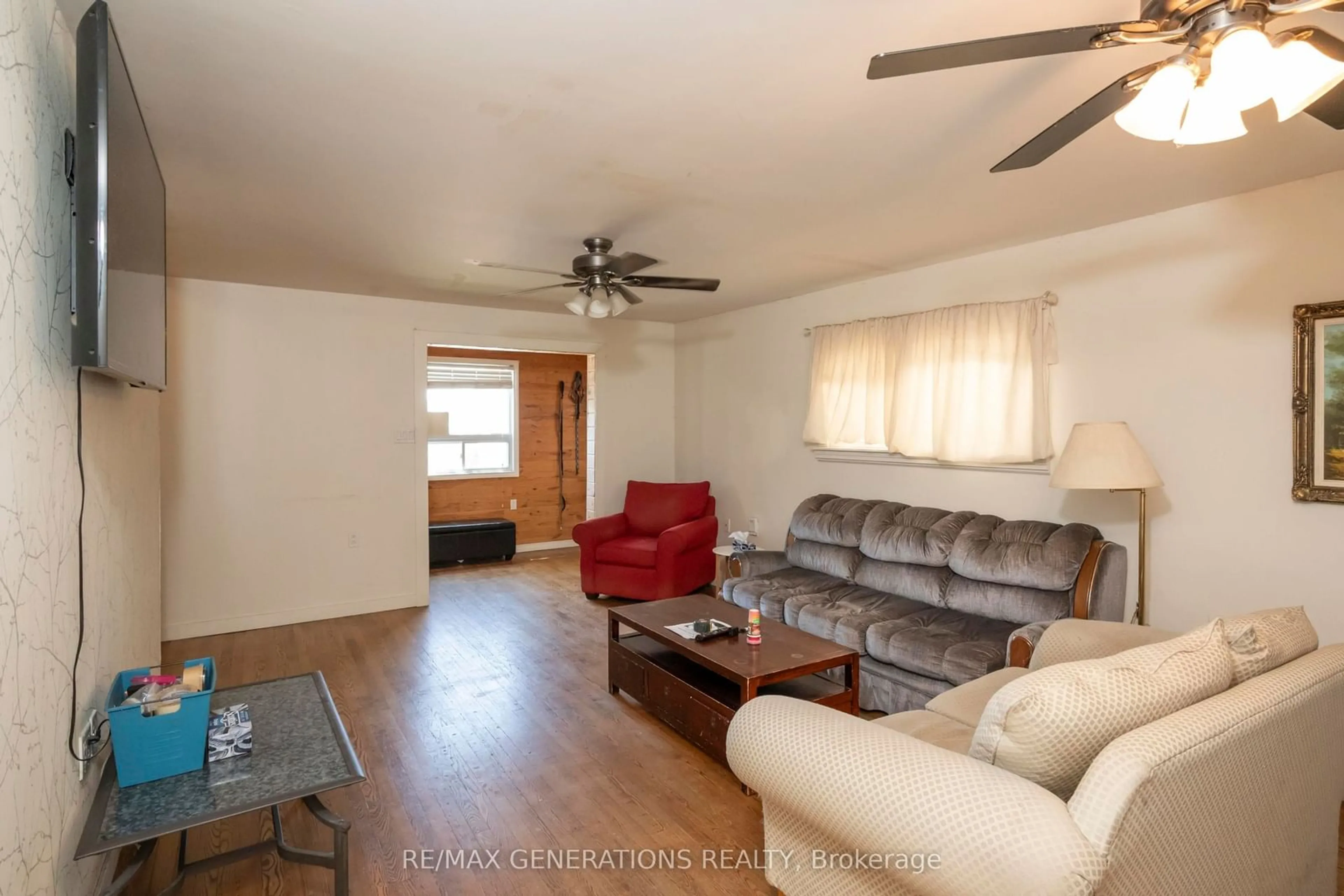 Living room with furniture, wood/laminate floor for 115 Finlayson St, Thunder Bay Ontario P7C 2K5