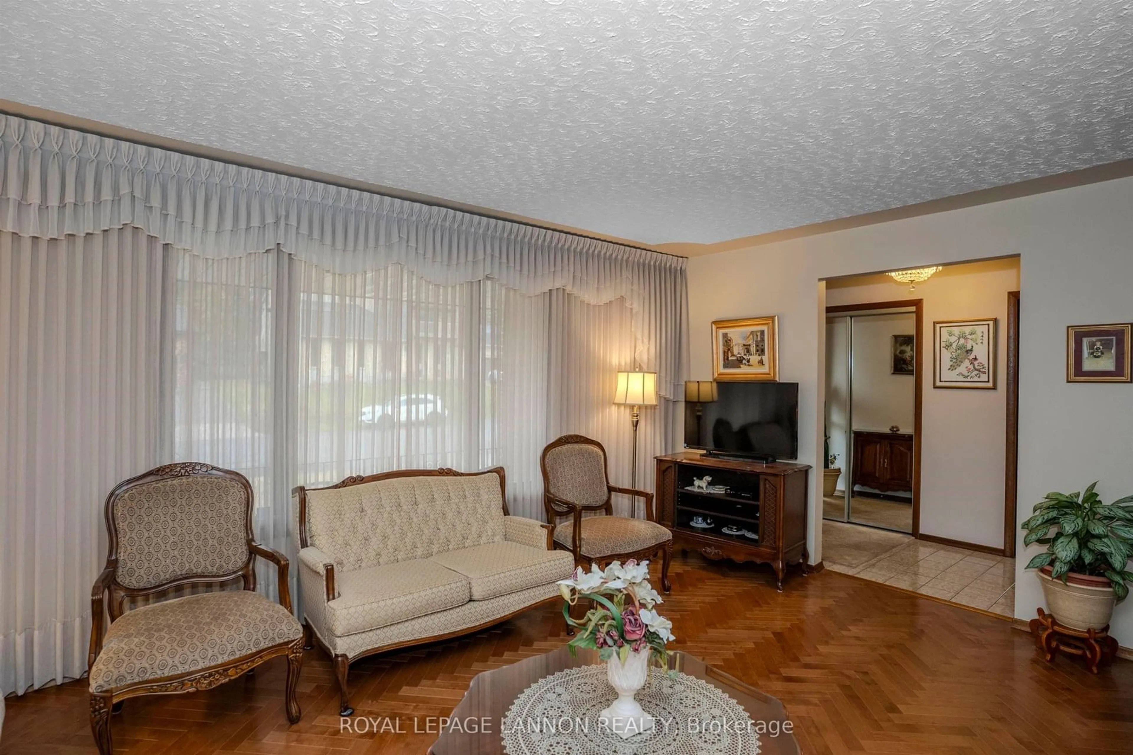 Living room with furniture, wood/laminate floor for 149 Masters St, Thunder Bay Ontario P7B 6L6