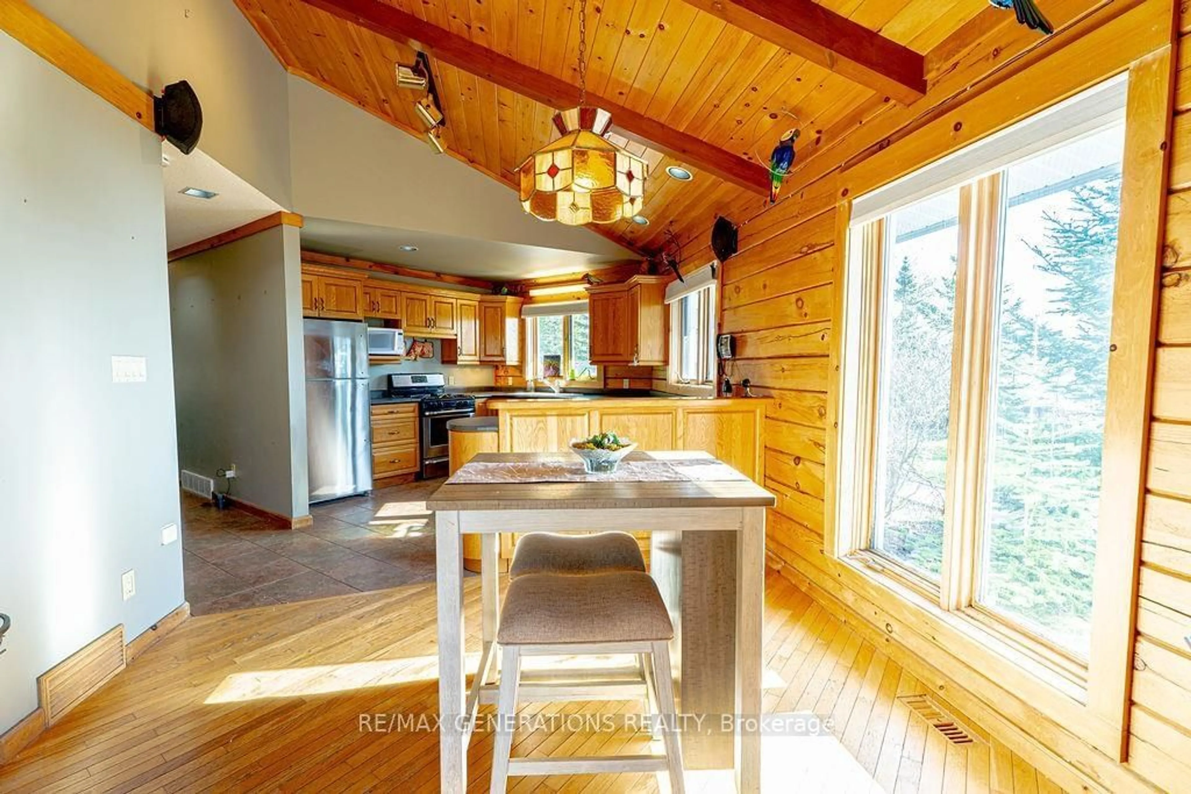 Open concept kitchen, wood/laminate floor for 106 ISLAND Ave, Neebing Ontario P7L 0C1