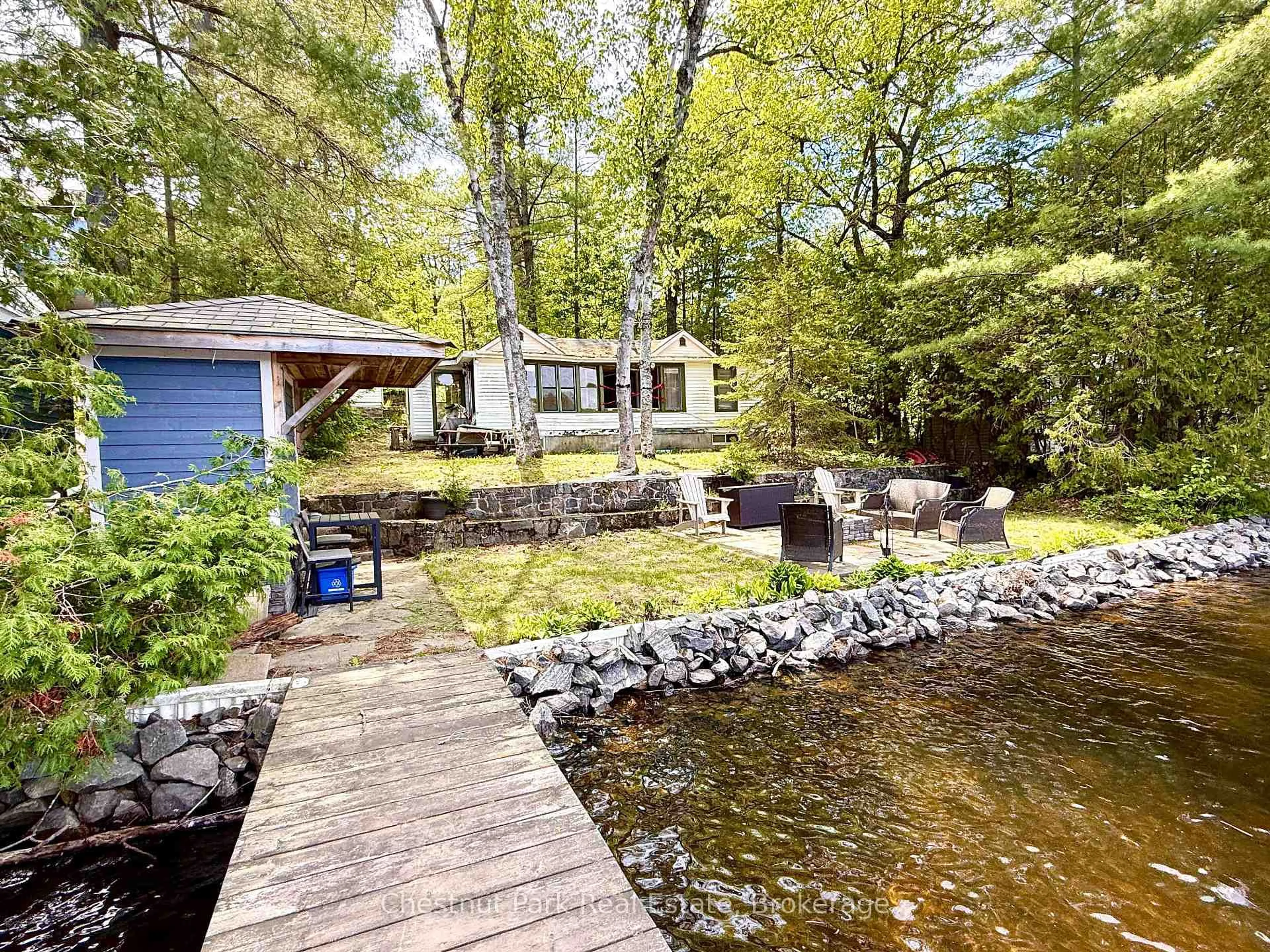 A pic from outside/outdoor area/front of a property/back of a property/a pic from drone, water/lake/river/ocean view for 1042 Road 3100 Rd, Gravenhurst Ontario P1P 1R2