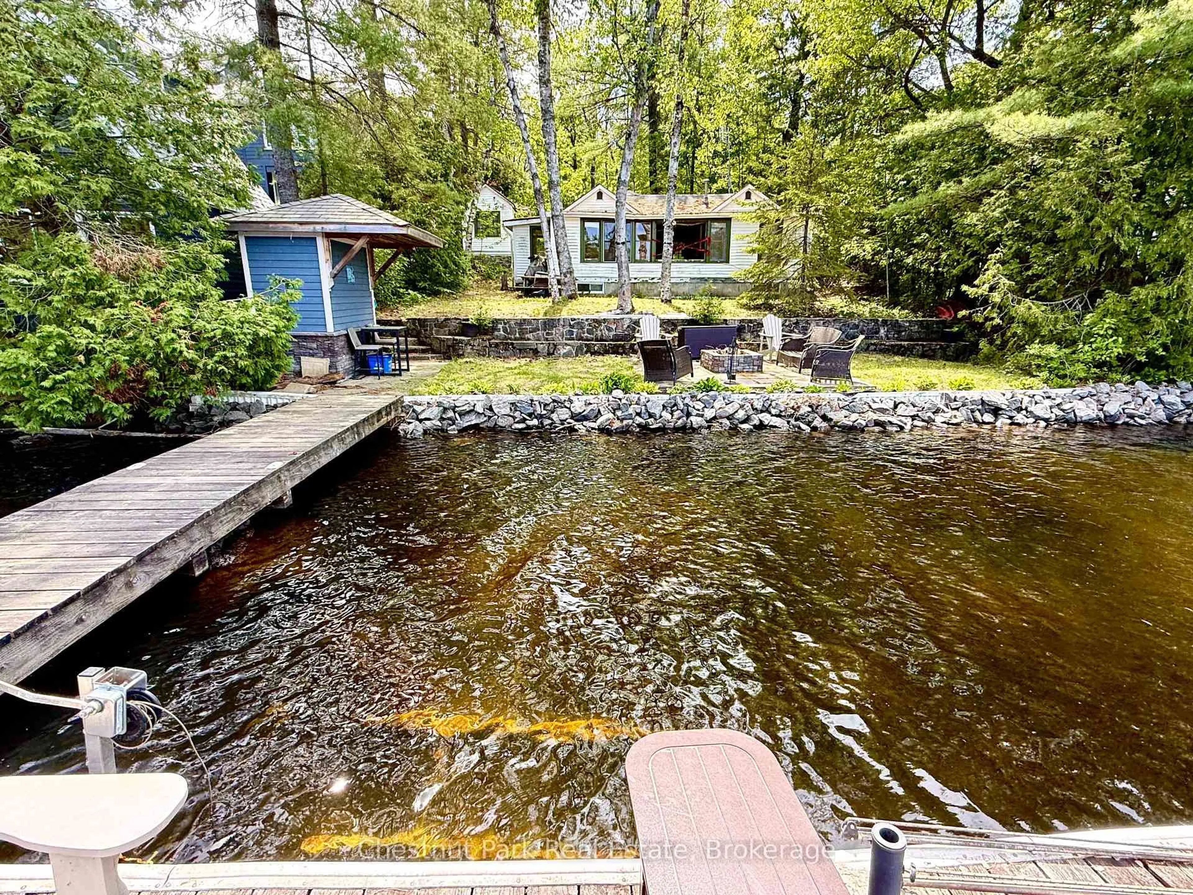 A pic from outside/outdoor area/front of a property/back of a property/a pic from drone, water/lake/river/ocean view for 1042 Road 3100 Rd, Gravenhurst Ontario P1P 1R2
