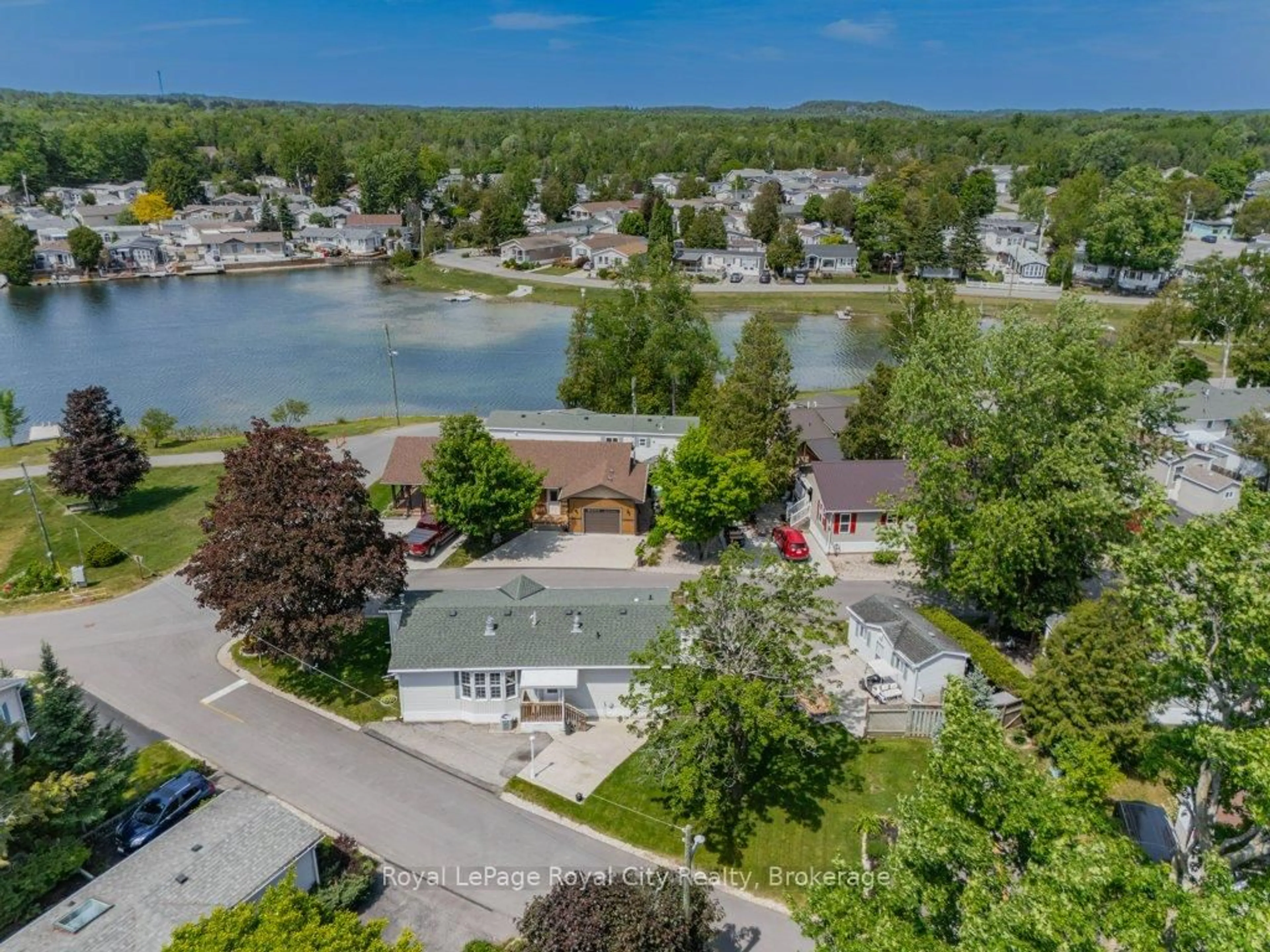 A pic from outside/outdoor area/front of a property/back of a property/a pic from drone, water/lake/river/ocean view for 1 Pine Lane, Puslinch Ontario N0B 2J0