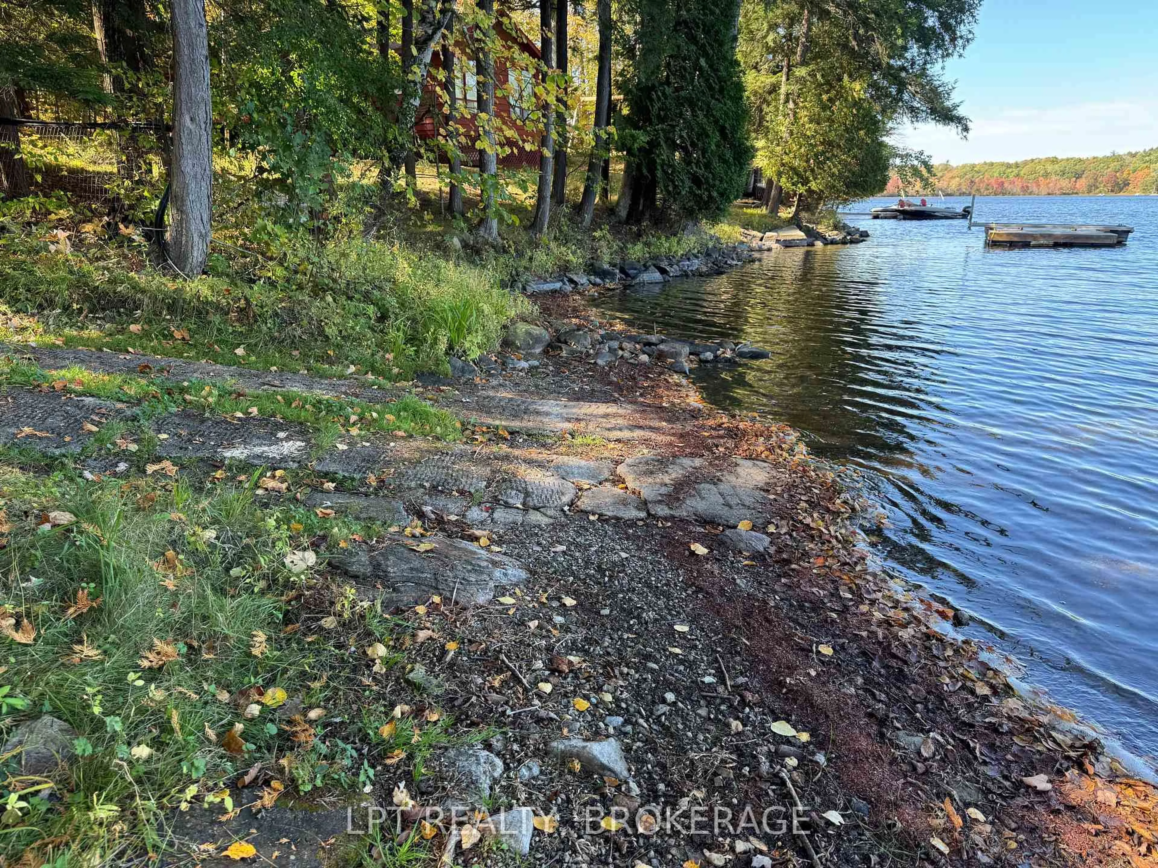 A pic from outside/outdoor area/front of a property/back of a property/a pic from drone, water/lake/river/ocean view for 500 Yvon Lane, Rideau Lakes Ontario K0G 1X0