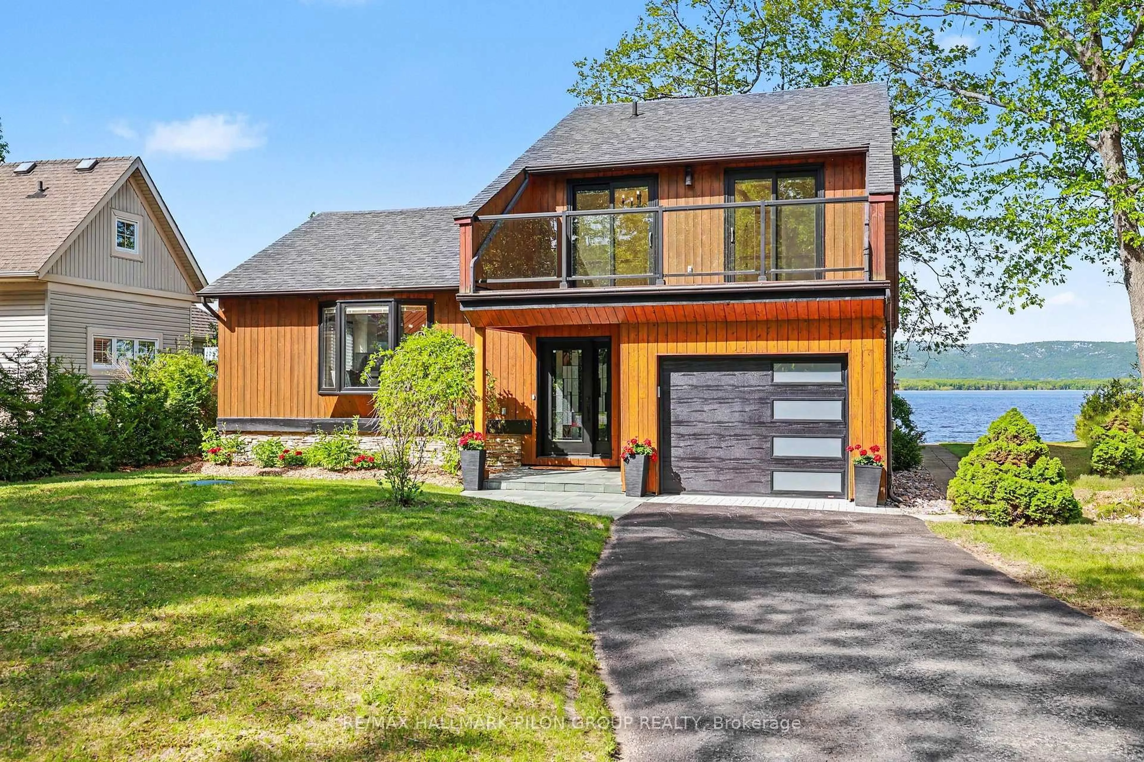 Home with brick exterior material, water/lake/river/ocean view for 584 Bayview Dr, Ottawa Ontario K0A 3M0