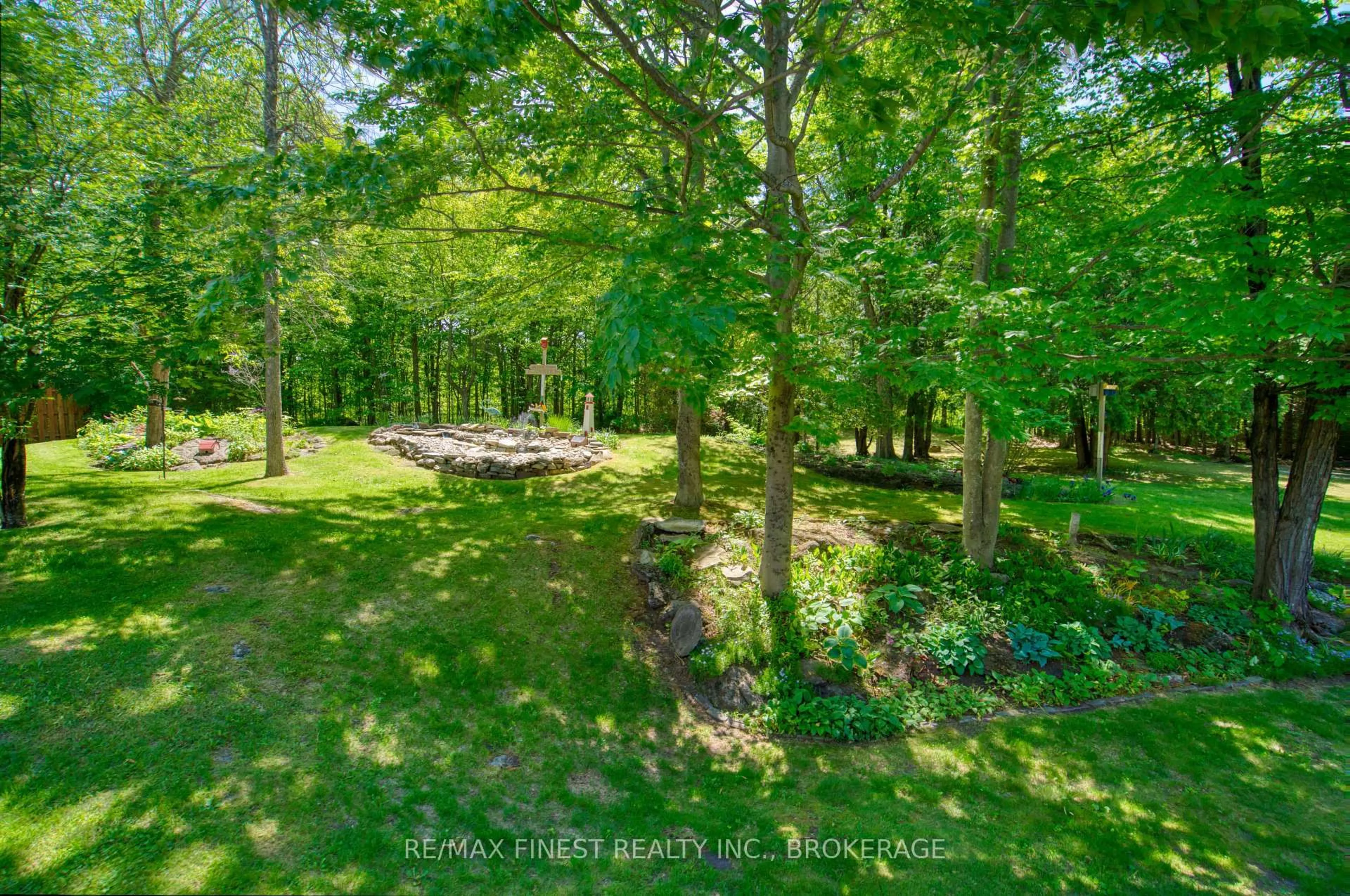 A pic from outside/outdoor area/front of a property/back of a property/a pic from drone, forest/trees view for 5895 Davey Dr, Verona Ontario K0H 2W0