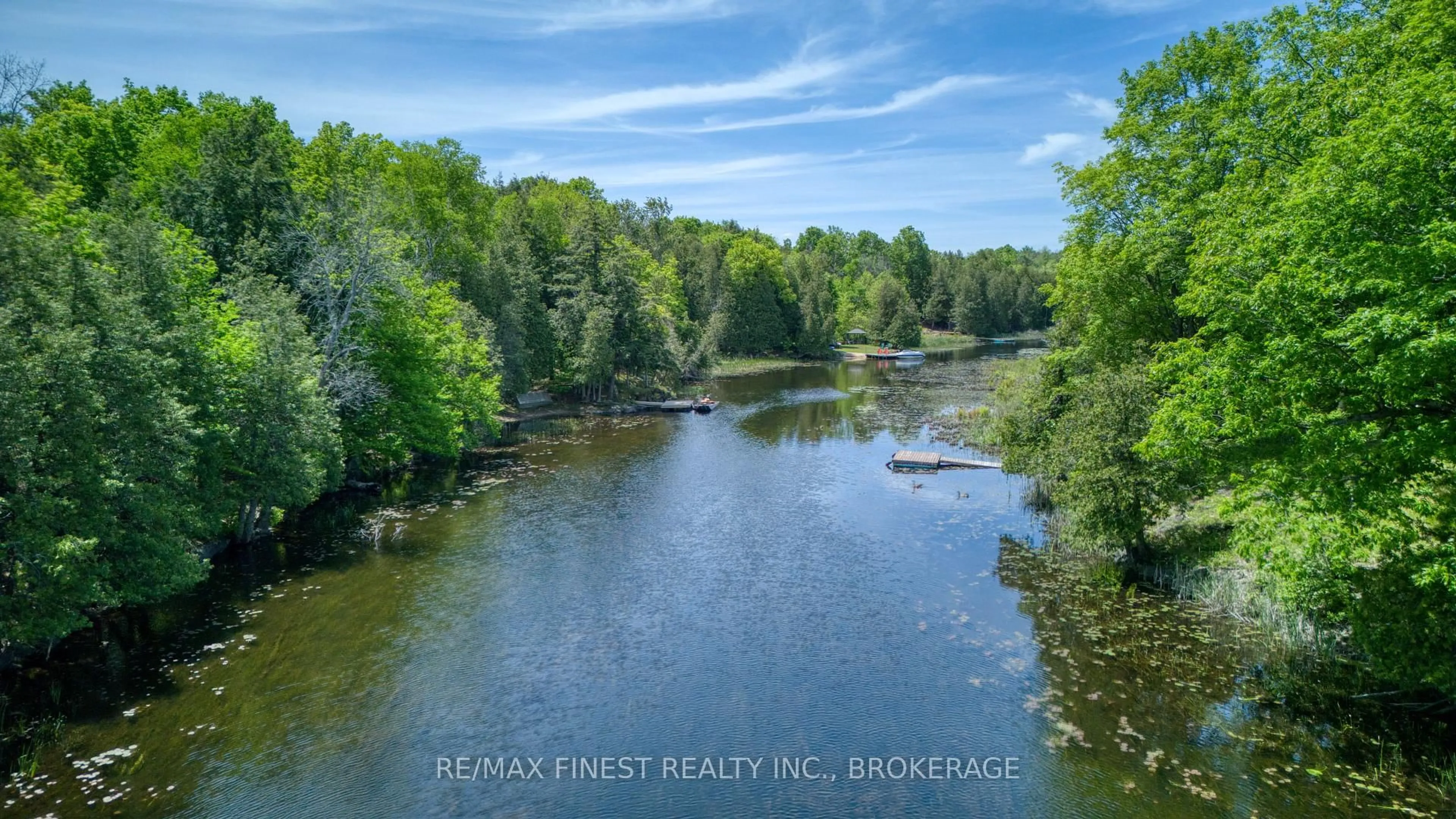 A pic from outside/outdoor area/front of a property/back of a property/a pic from drone, water/lake/river/ocean view for 5895 Davey Dr, Verona Ontario K0H 2W0