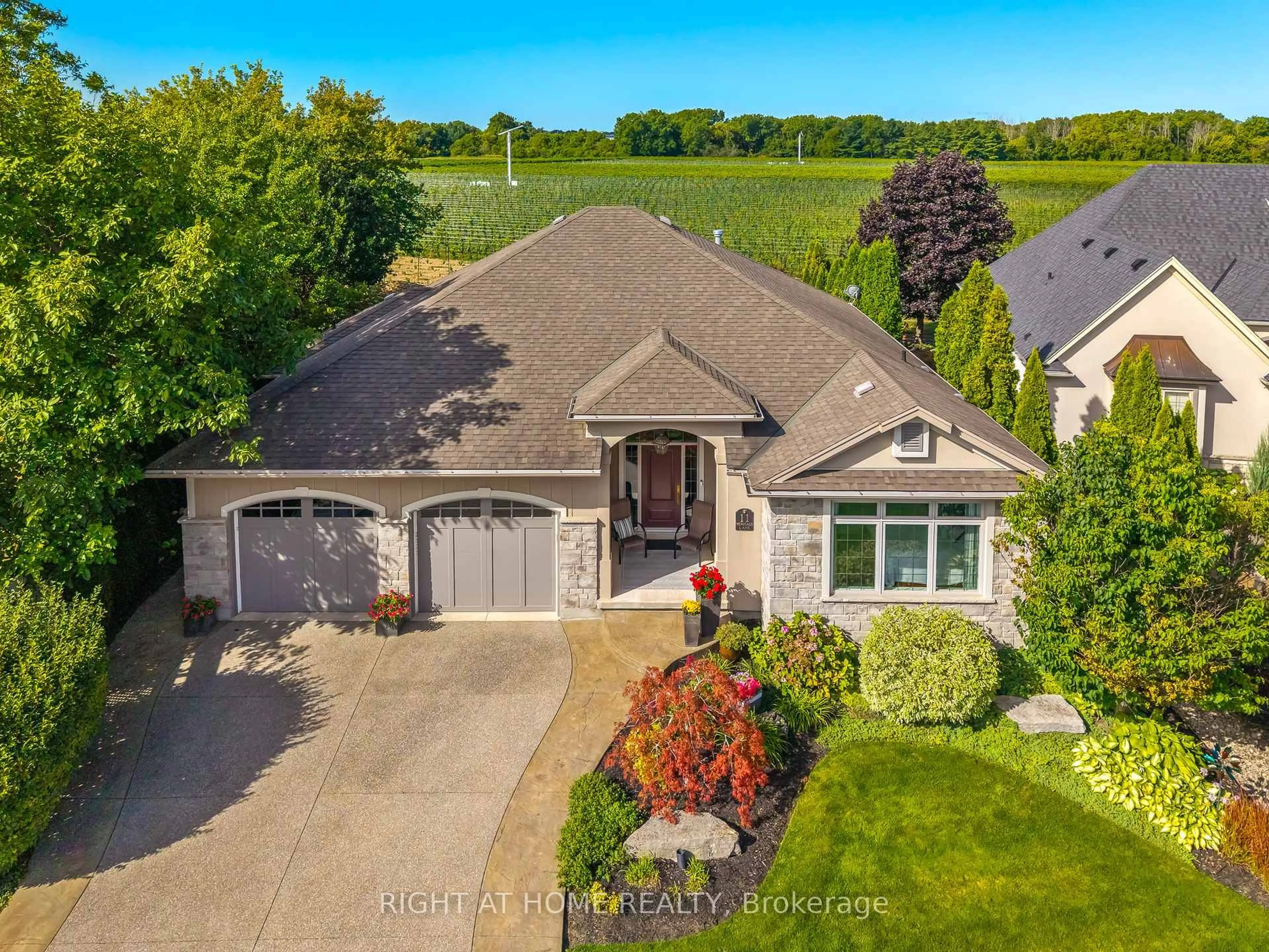 A pic from outside/outdoor area/front of a property/back of a property/a pic from drone, street for 11 Meritage Lane, Niagara-on-the-Lake Ontario L0S 1J0