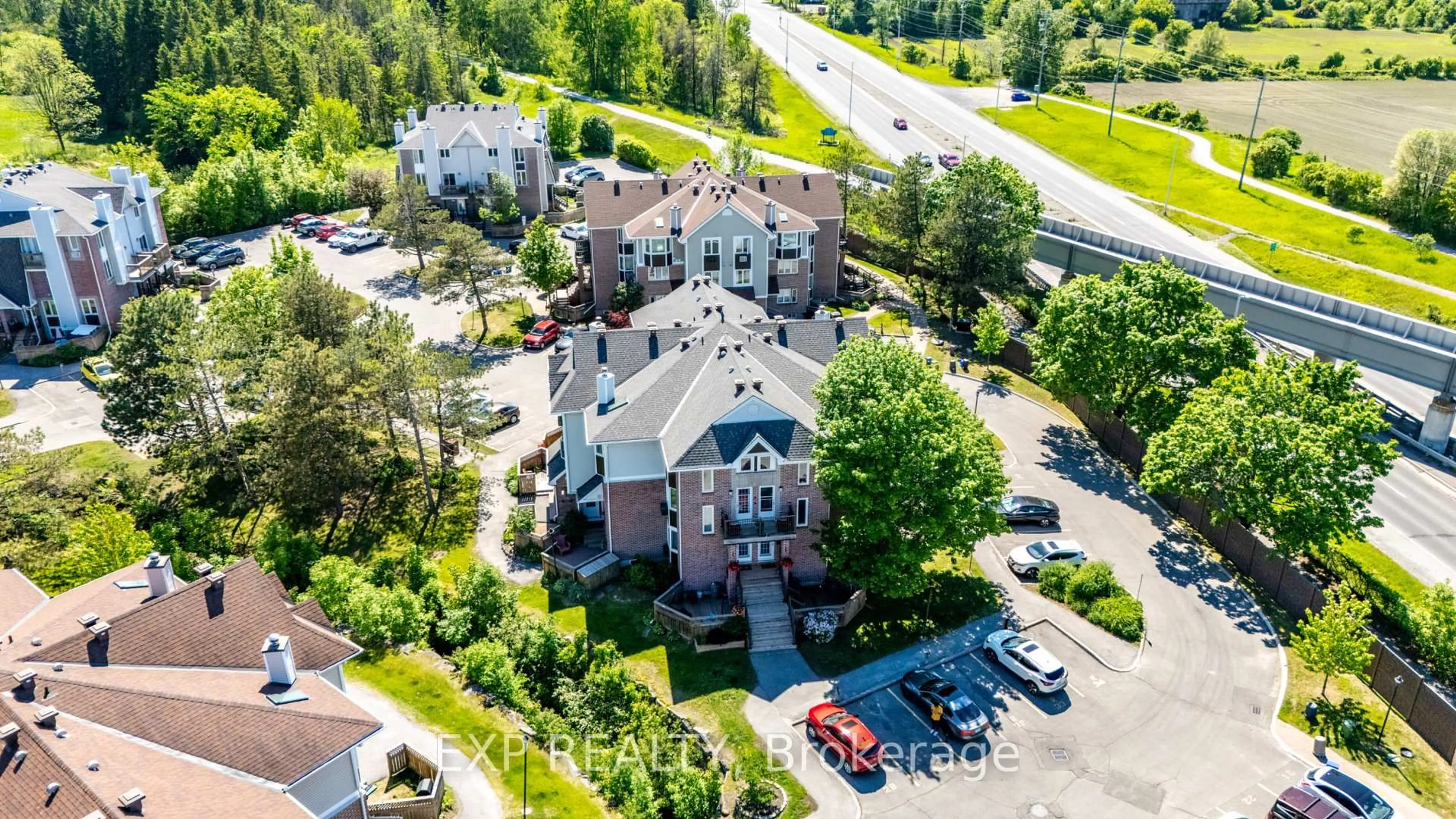 A pic from outside/outdoor area/front of a property/back of a property/a pic from drone, unknown for 2 Stonebank Cres #7, Ottawa Ontario K2H 9M1