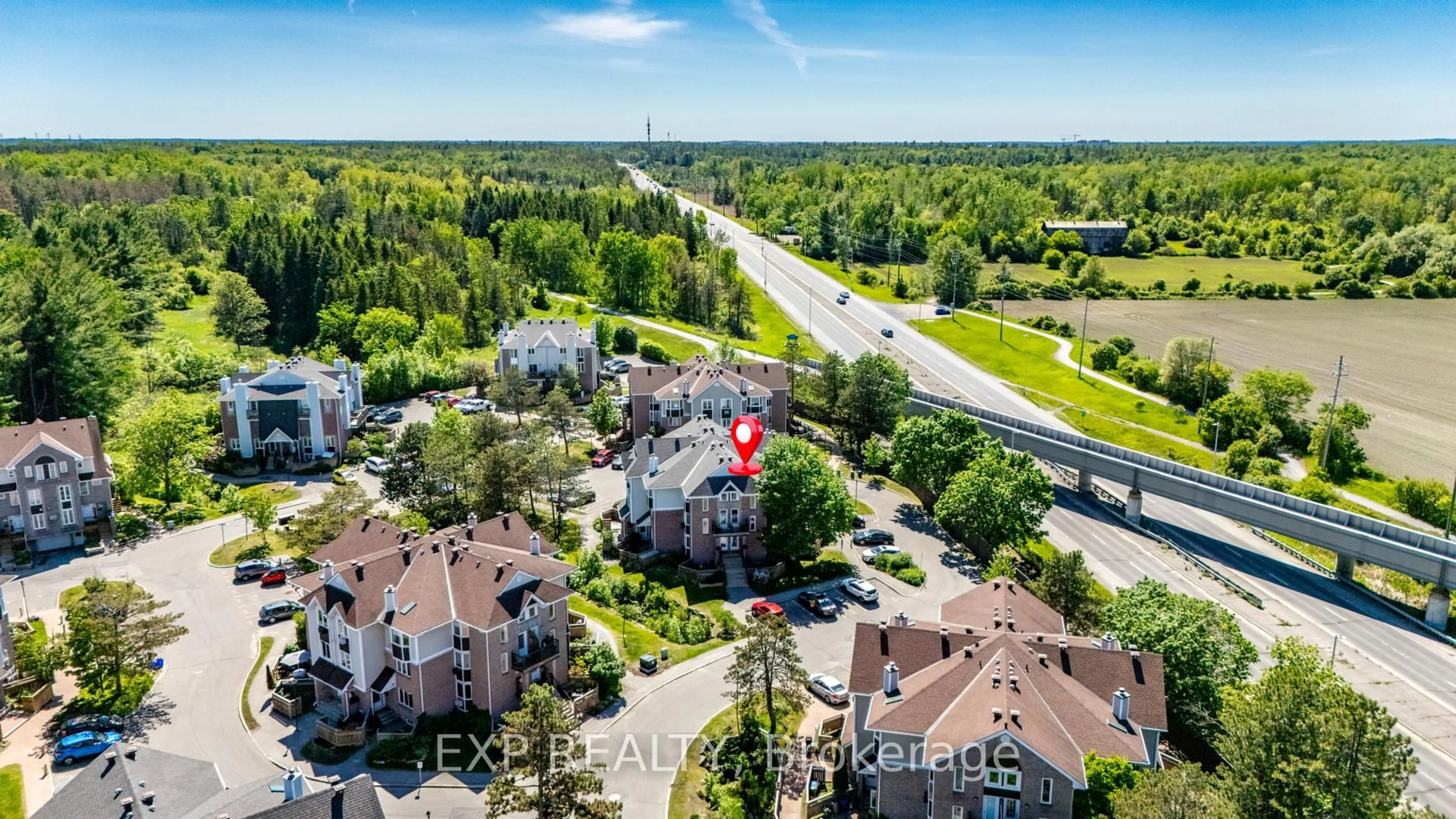 A pic from outside/outdoor area/front of a property/back of a property/a pic from drone, street for 2 Stonebank Cres #7, Ottawa Ontario K2H 9M1