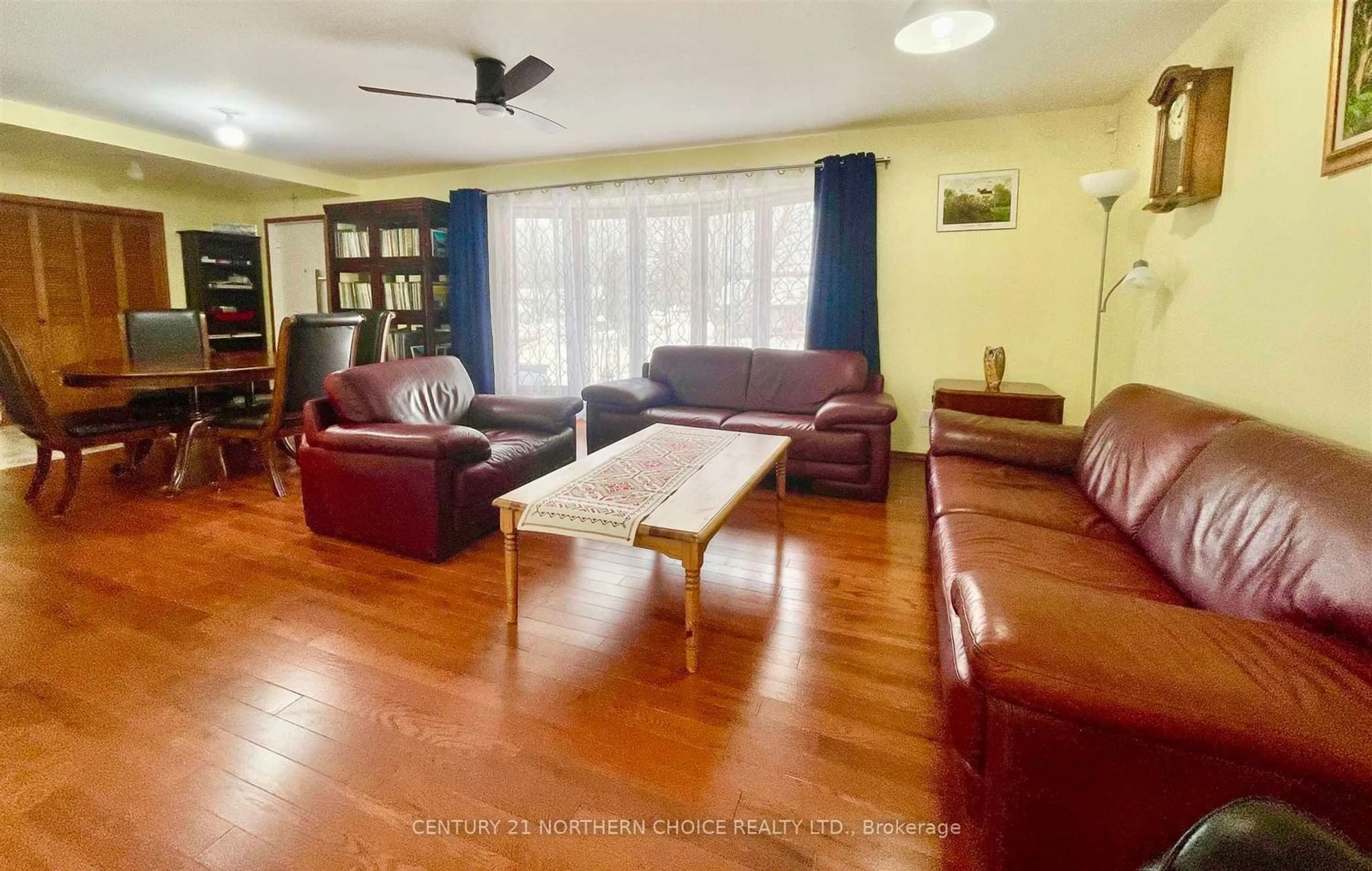 Living room with furniture, wood/laminate floor for 228 Taylor St, Dryden Ontario P8N 1M6