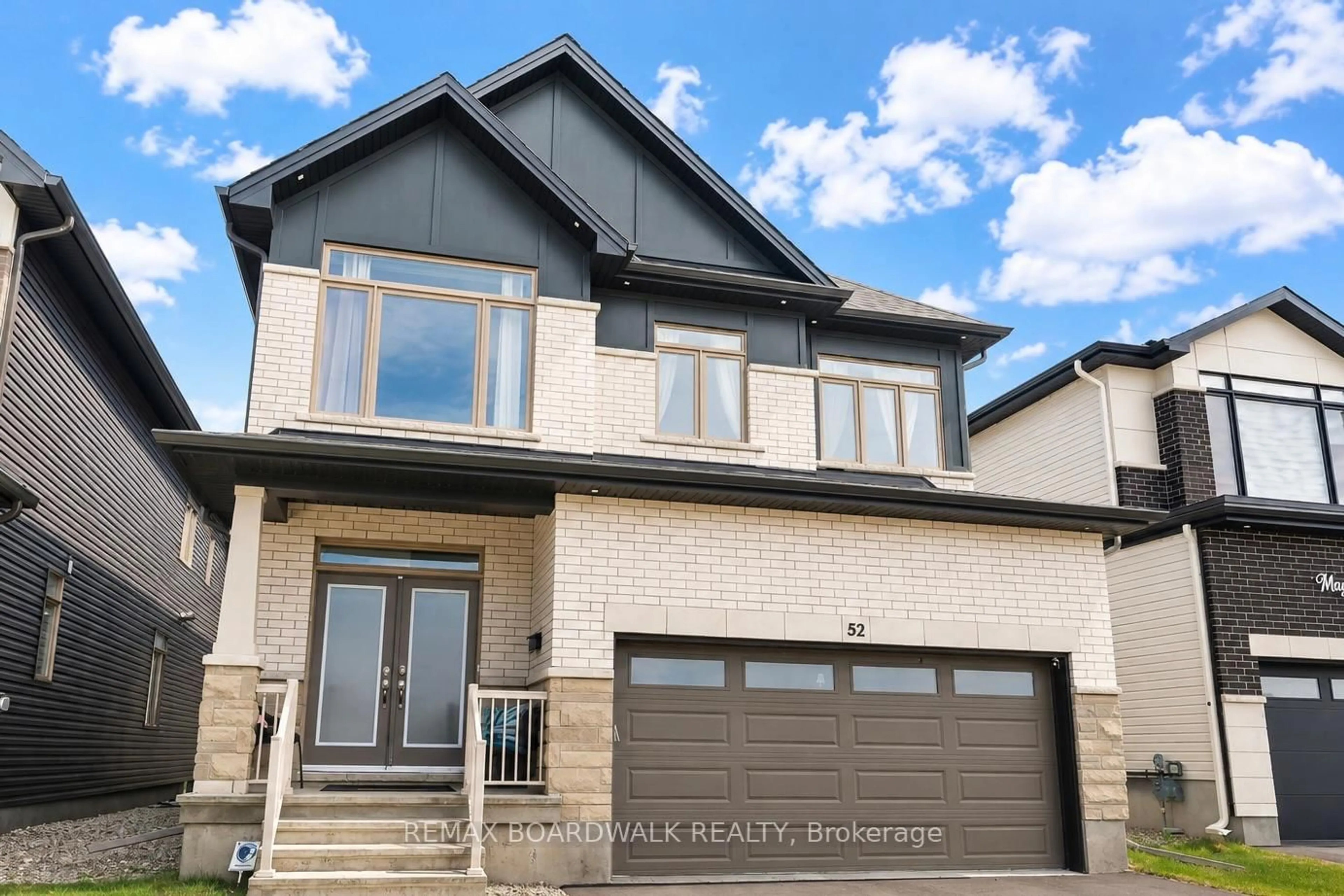 Home with brick exterior material, street for 52 Big Dipper St, Ottawa Ontario K4M 0L7