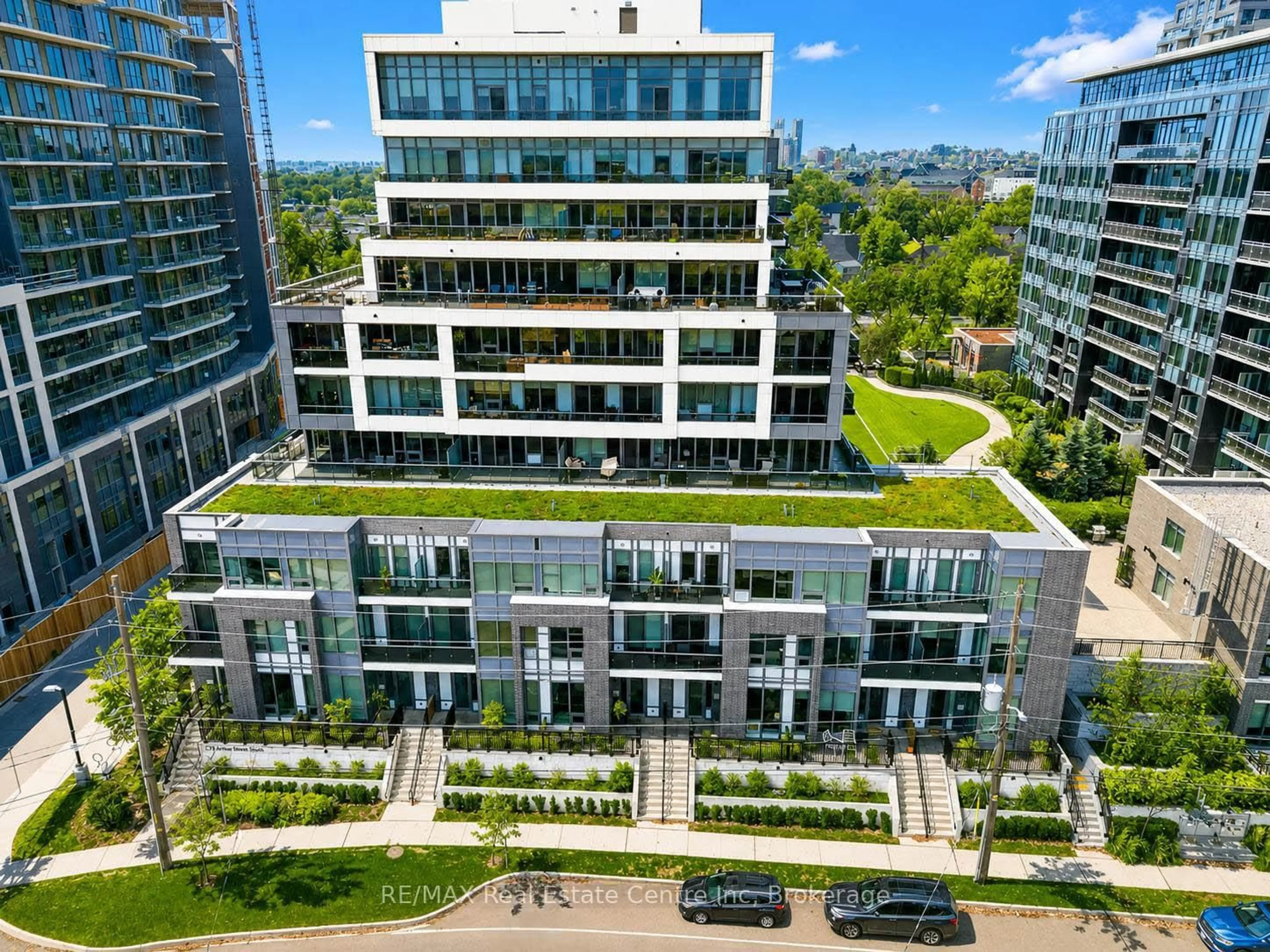 A pic from outside/outdoor area/front of a property/back of a property/a pic from drone, city buildings view from balcony for 73 ARTHUR St #103, Guelph Ontario N1E 0S6