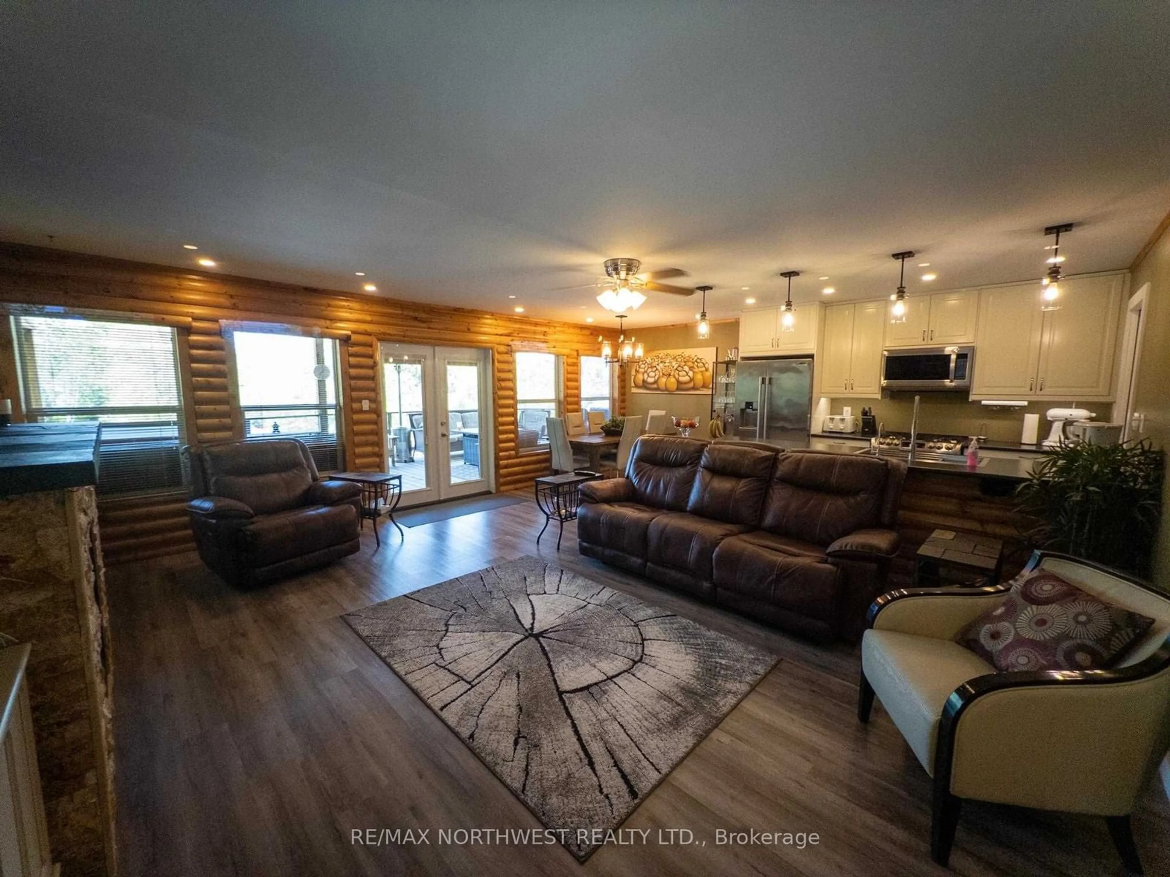 Living room with furniture, wood/laminate floor for 162 Hidden Trail Road, Kenora Ontario P9N 4P2