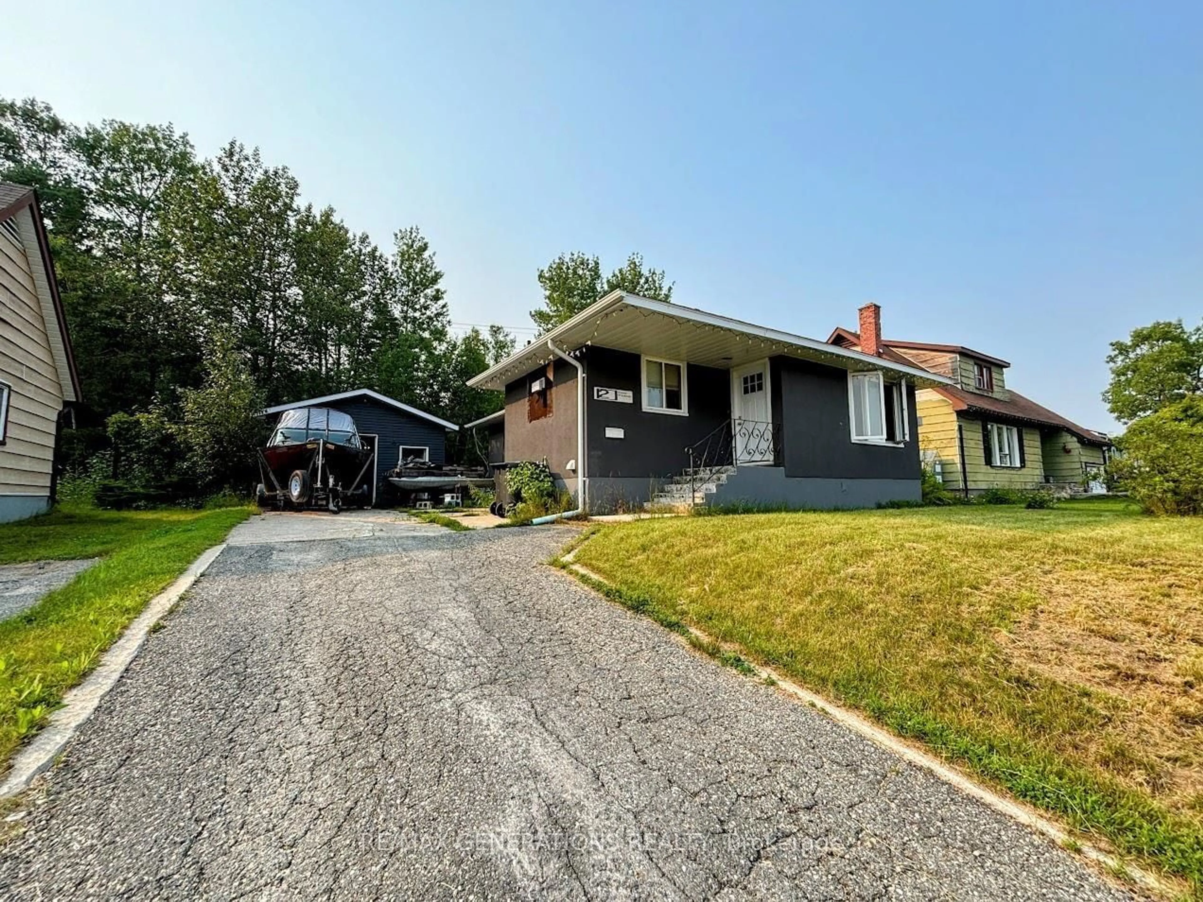 A pic from outside/outdoor area/front of a property/back of a property/a pic from drone, street for 2 Essa Pl, Manitouwadge Ontario P0T 2C0
