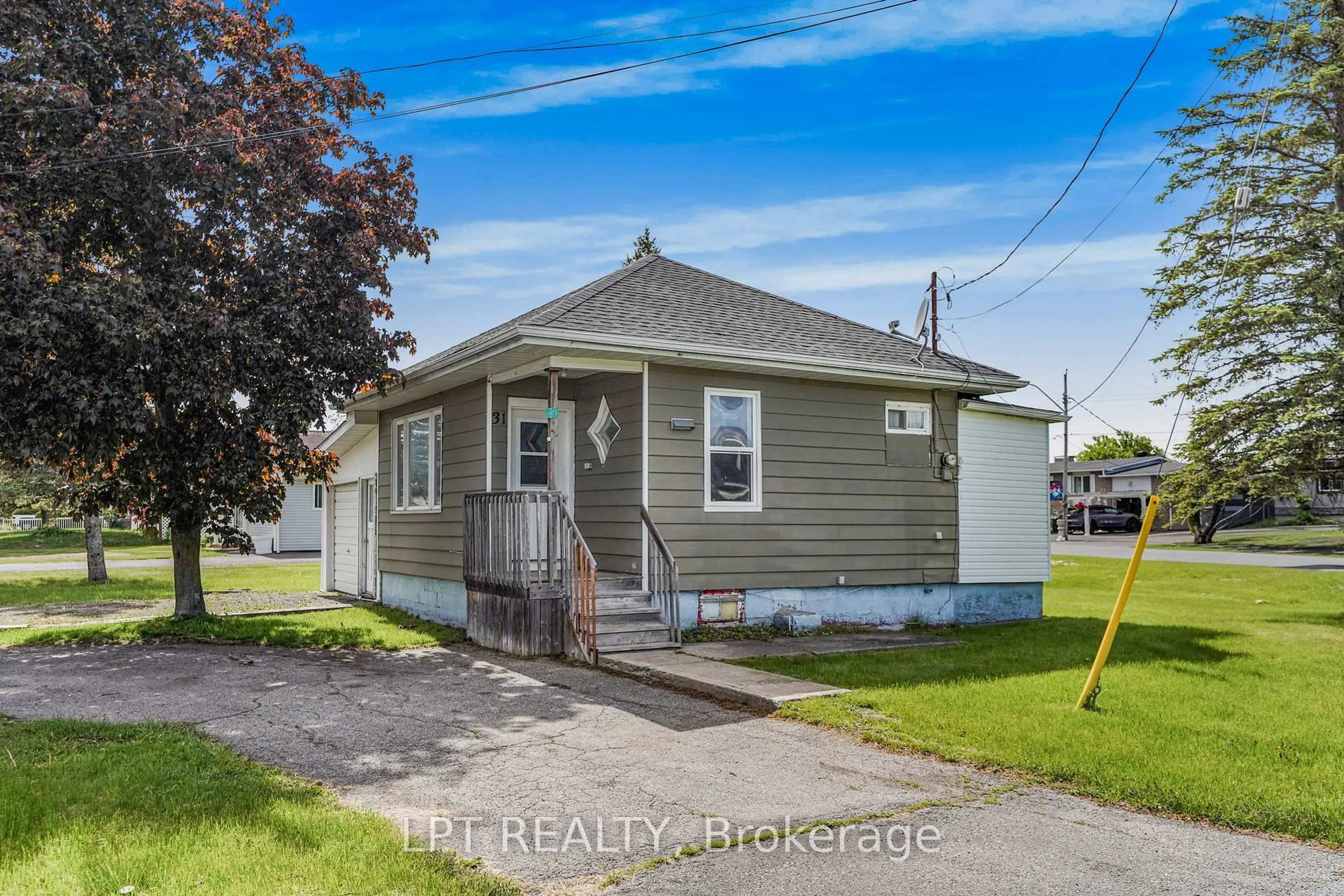 Home with vinyl exterior material, street for 31 Johnston St, Alfred and Plantagenet Ontario K0B 1A0