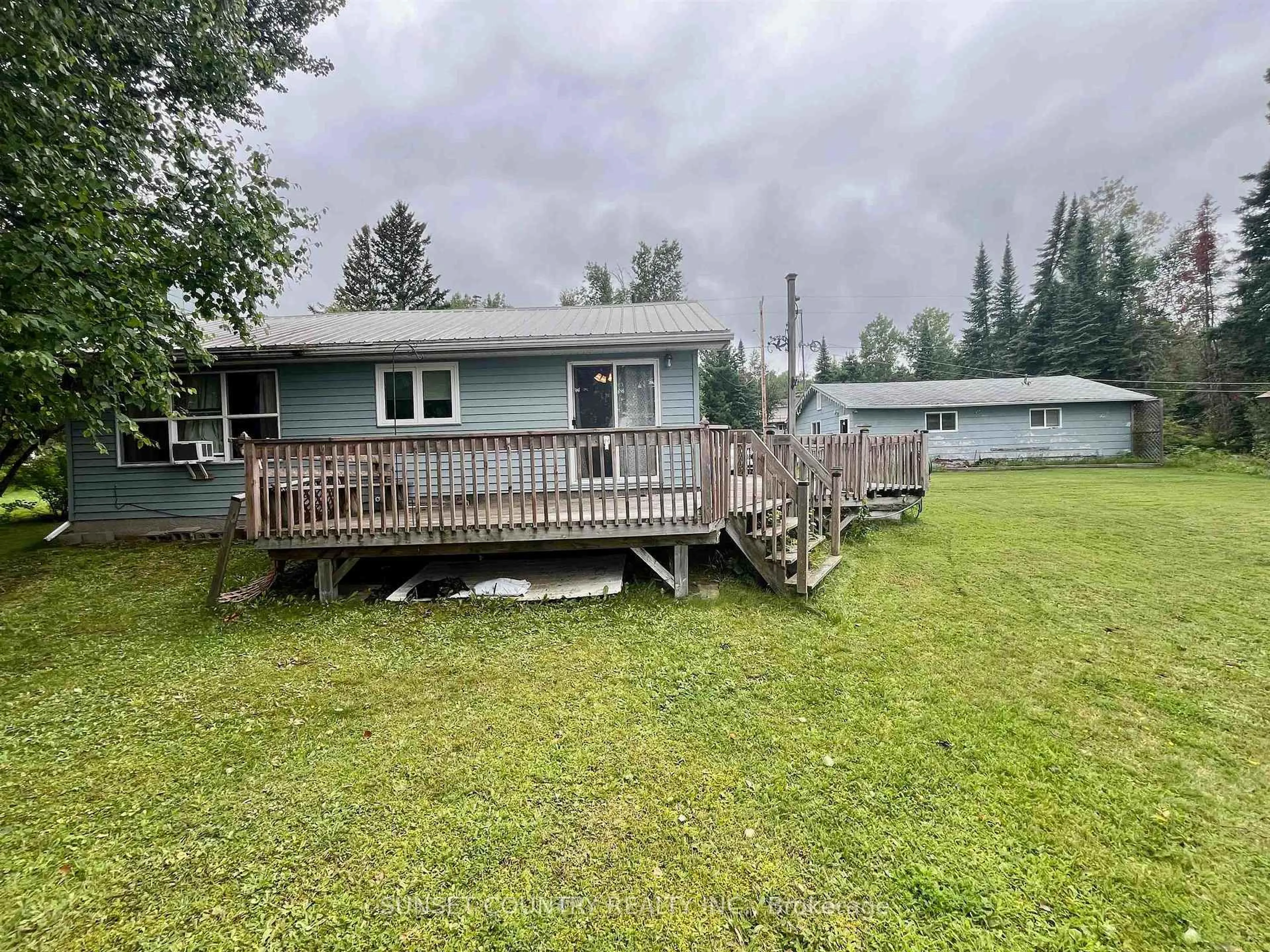 A pic from outside/outdoor area/front of a property/back of a property/a pic from drone, water/lake/river/ocean view for 206 McMillan Cres, Dryden Ontario P8N 0A2
