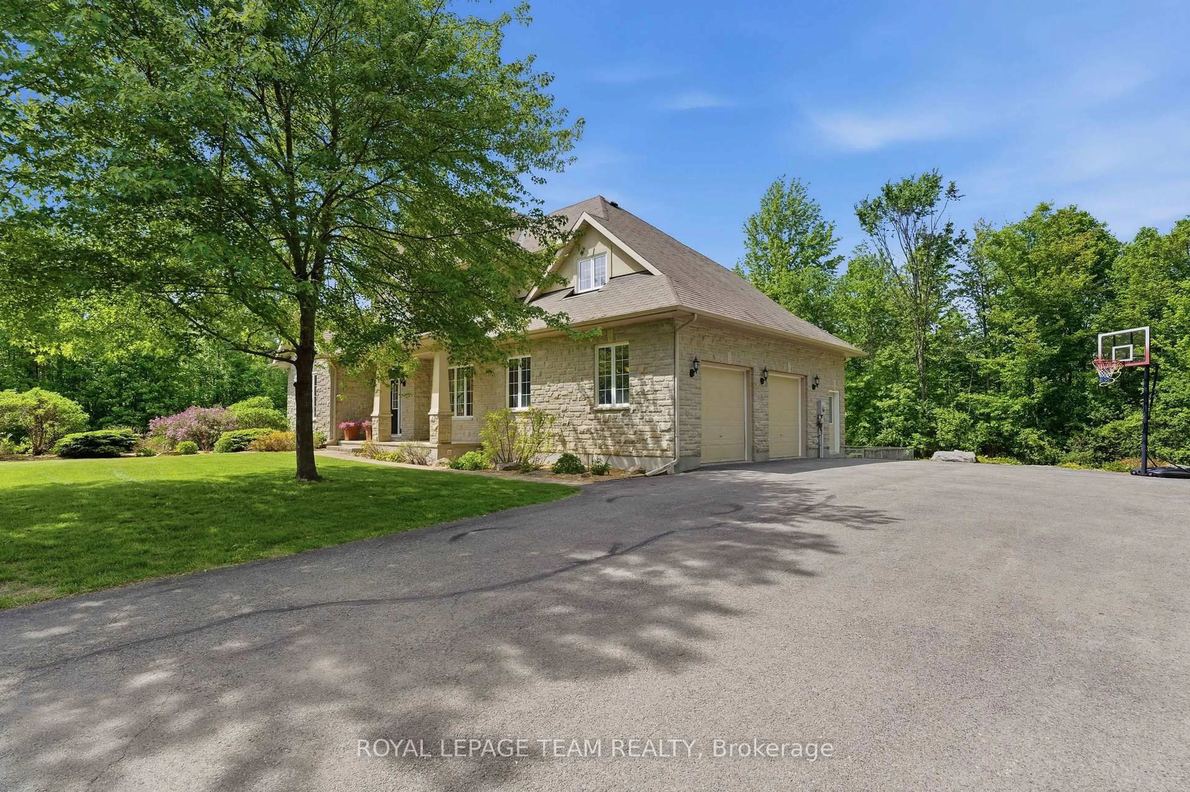 A pic from outside/outdoor area/front of a property/back of a property/a pic from drone, unknown for 234 Cyd St, Carp Ontario K0A 1L0