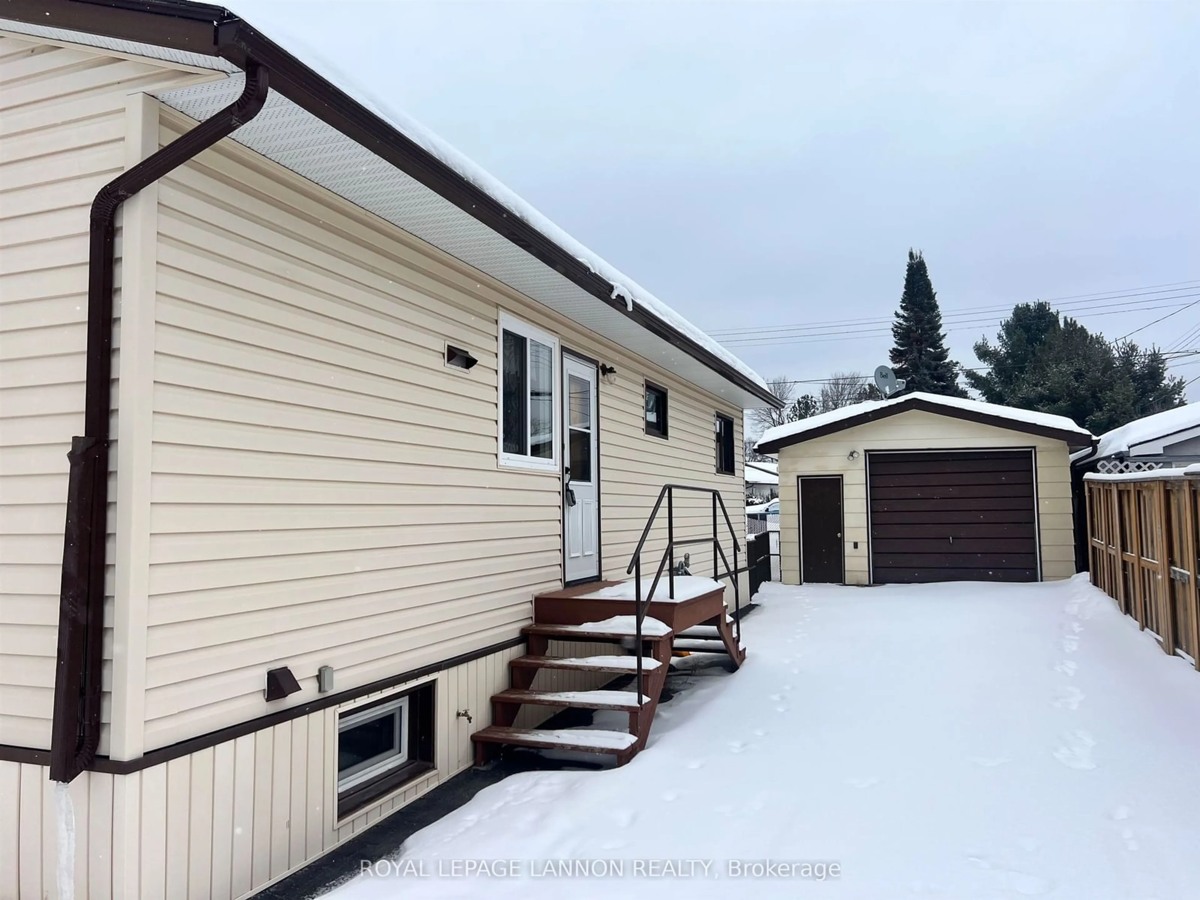 Home with vinyl exterior material, street for 146 Pine Cres, Atikokan Ontario P0T 1C0