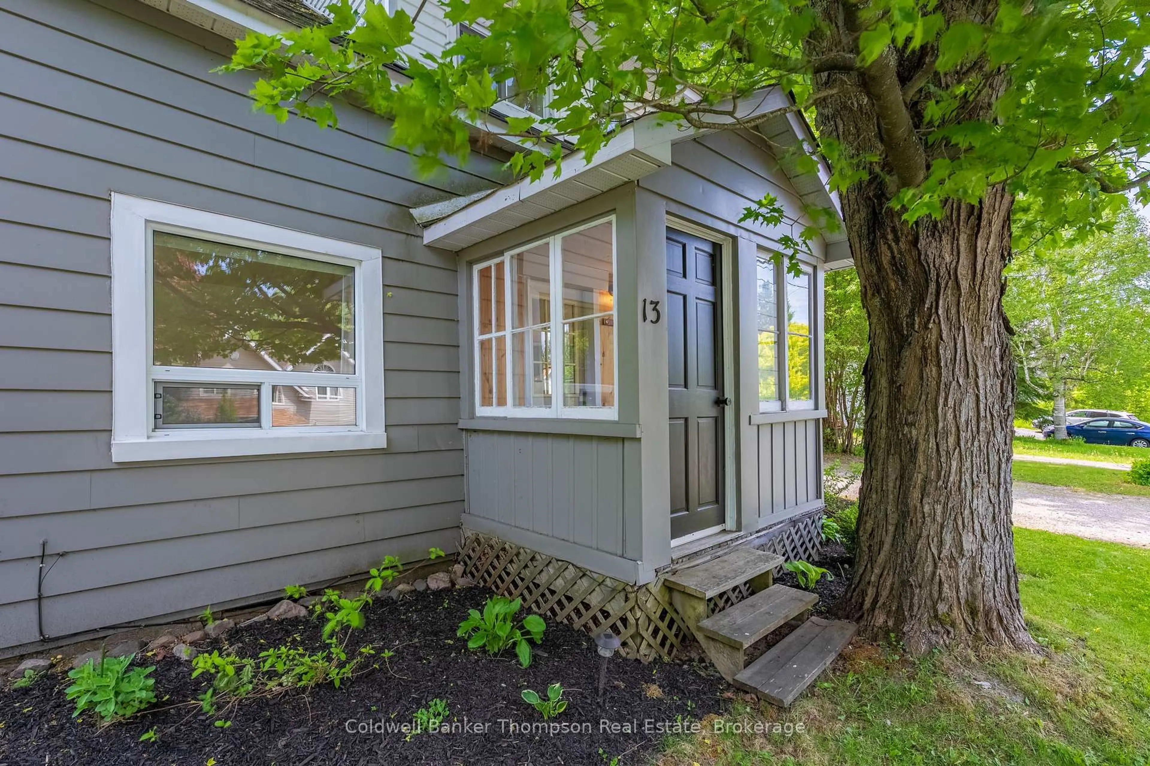 Home with vinyl exterior material, street for 13 Johanna St, Huntsville Ontario P1H 1T9