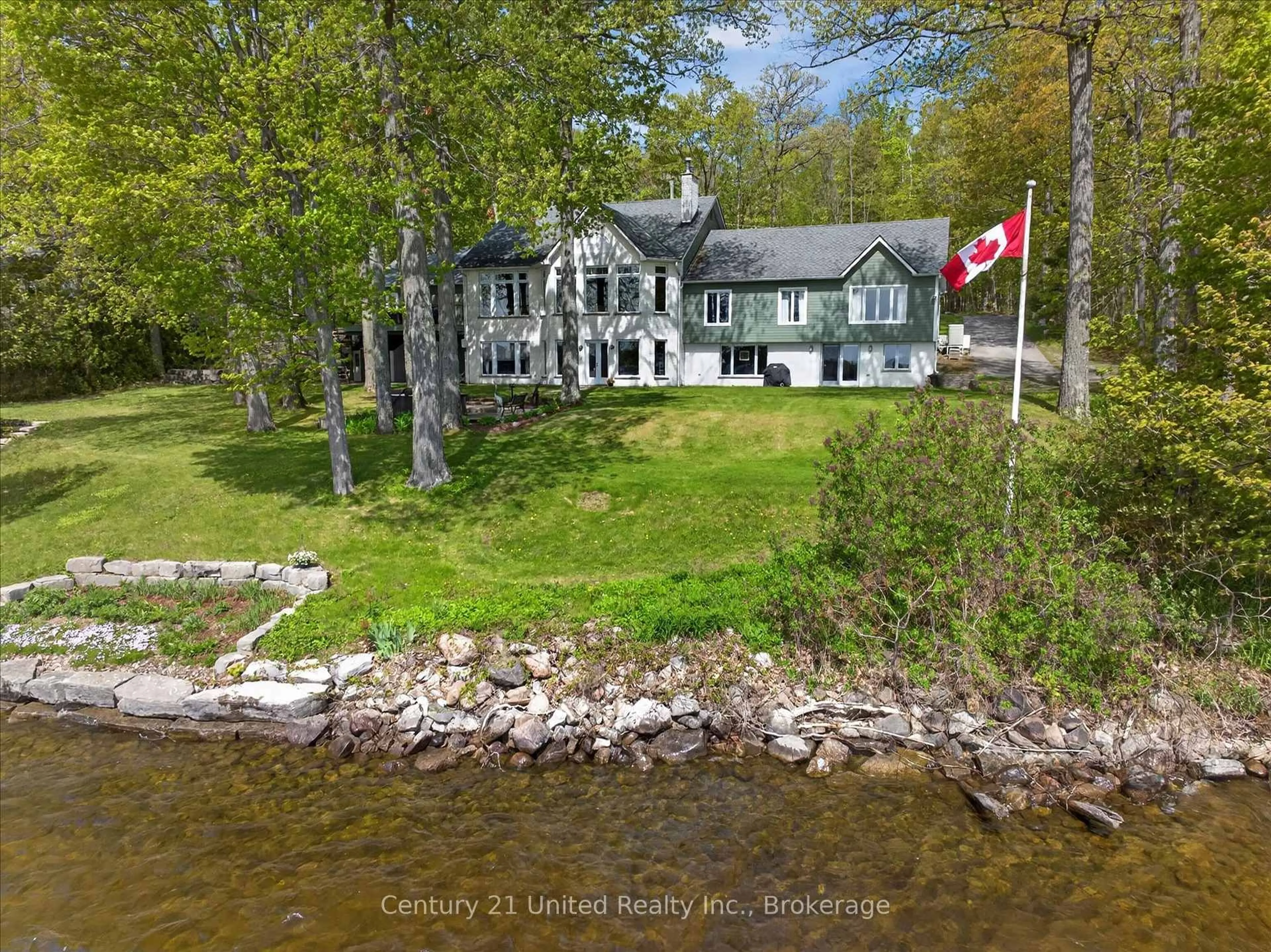 A pic from outside/outdoor area/front of a property/back of a property/a pic from drone, water/lake/river/ocean view for 3227 Fire Route 50, Selwyn Ontario K0L 2H0