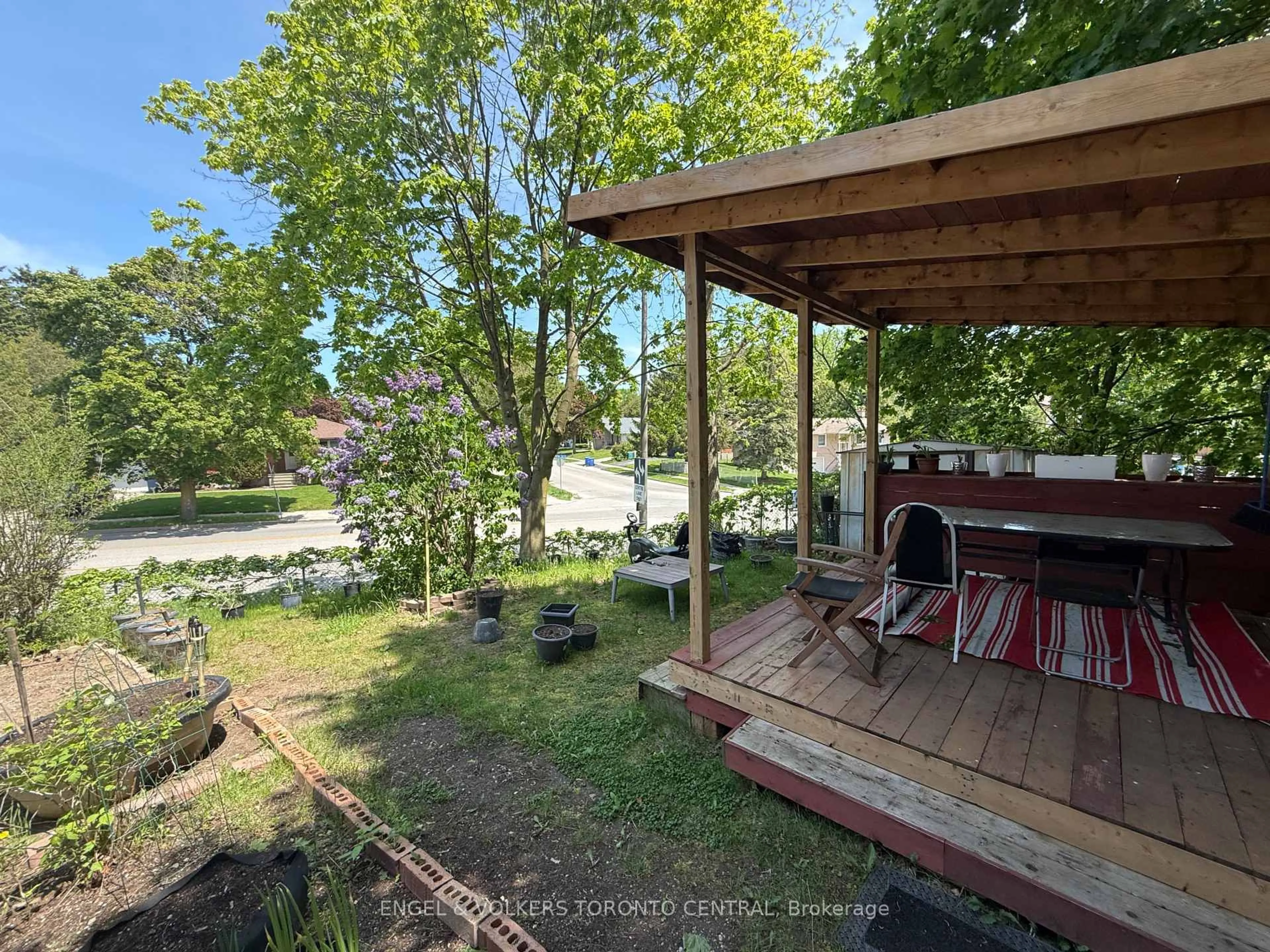 A pic from outside/outdoor area/front of a property/back of a property/a pic from drone, forest/trees view for 689 College Ave, Guelph Ontario N1G 2Y2