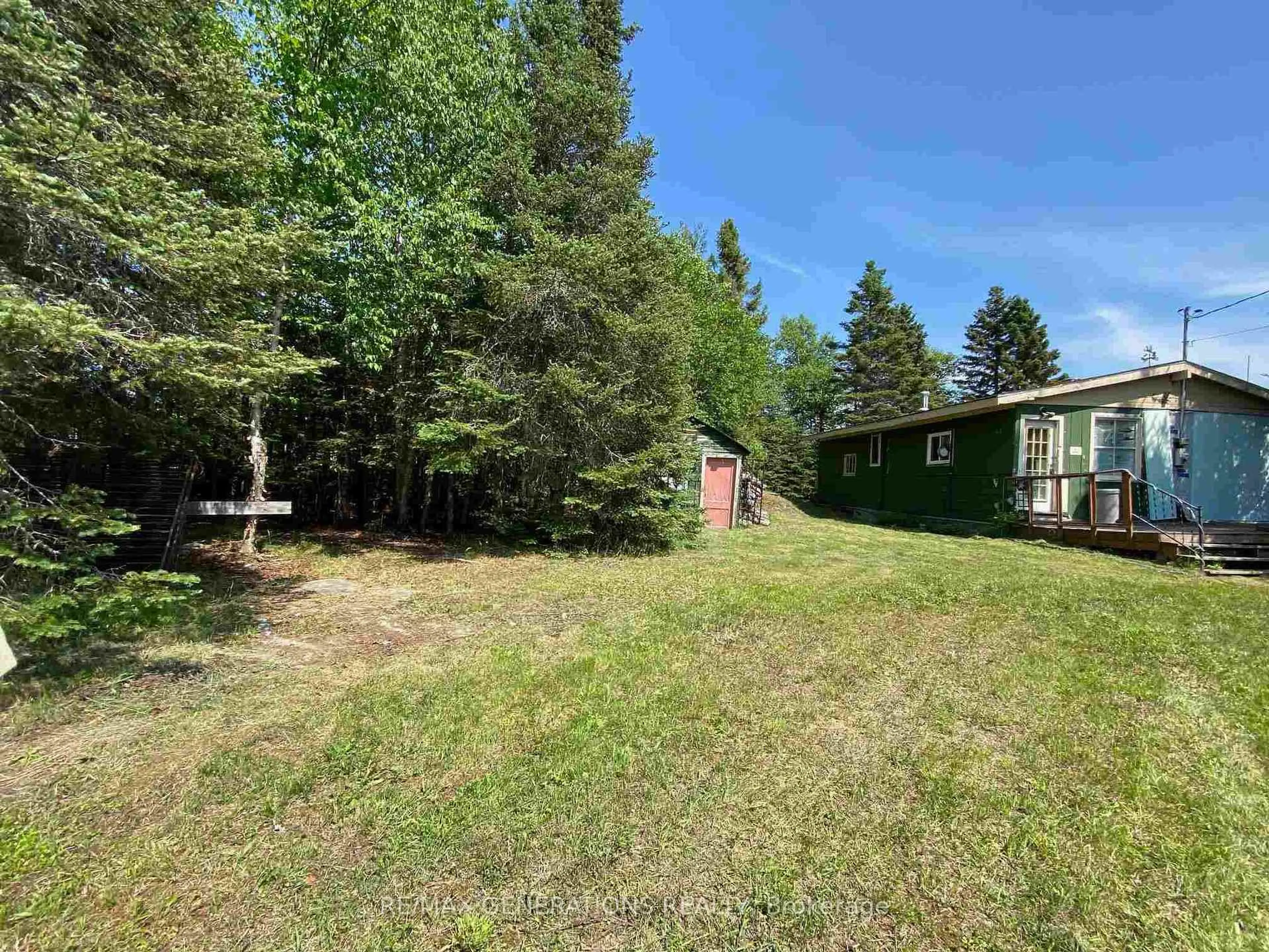 A pic from outside/outdoor area/front of a property/back of a property/a pic from drone, forest/trees view for 64 Sunrise Lane, Schreiber Ontario P0T 2S0