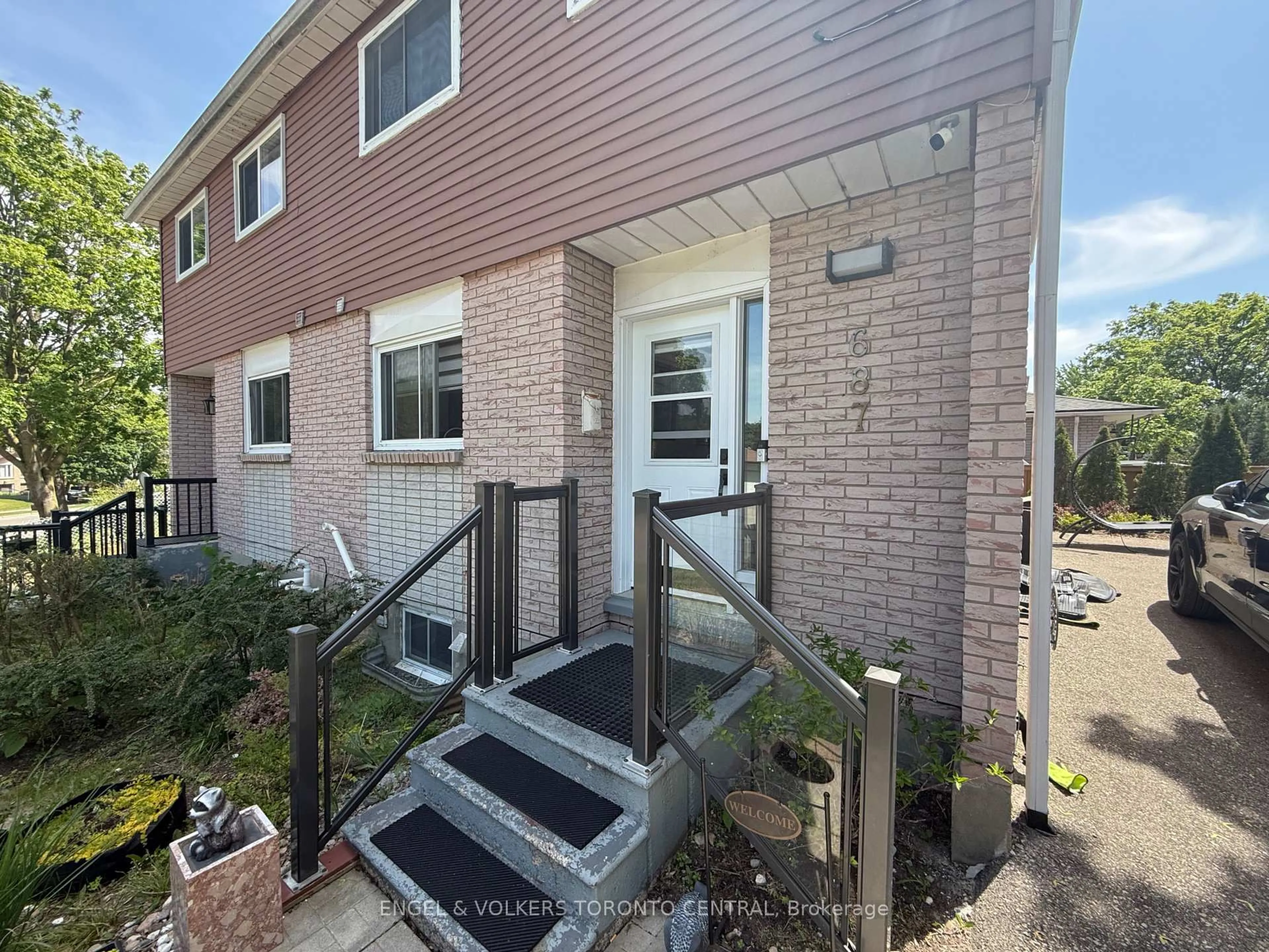 Home with brick exterior material, street for 687 College Ave, Guelph Ontario N1G 2Y2