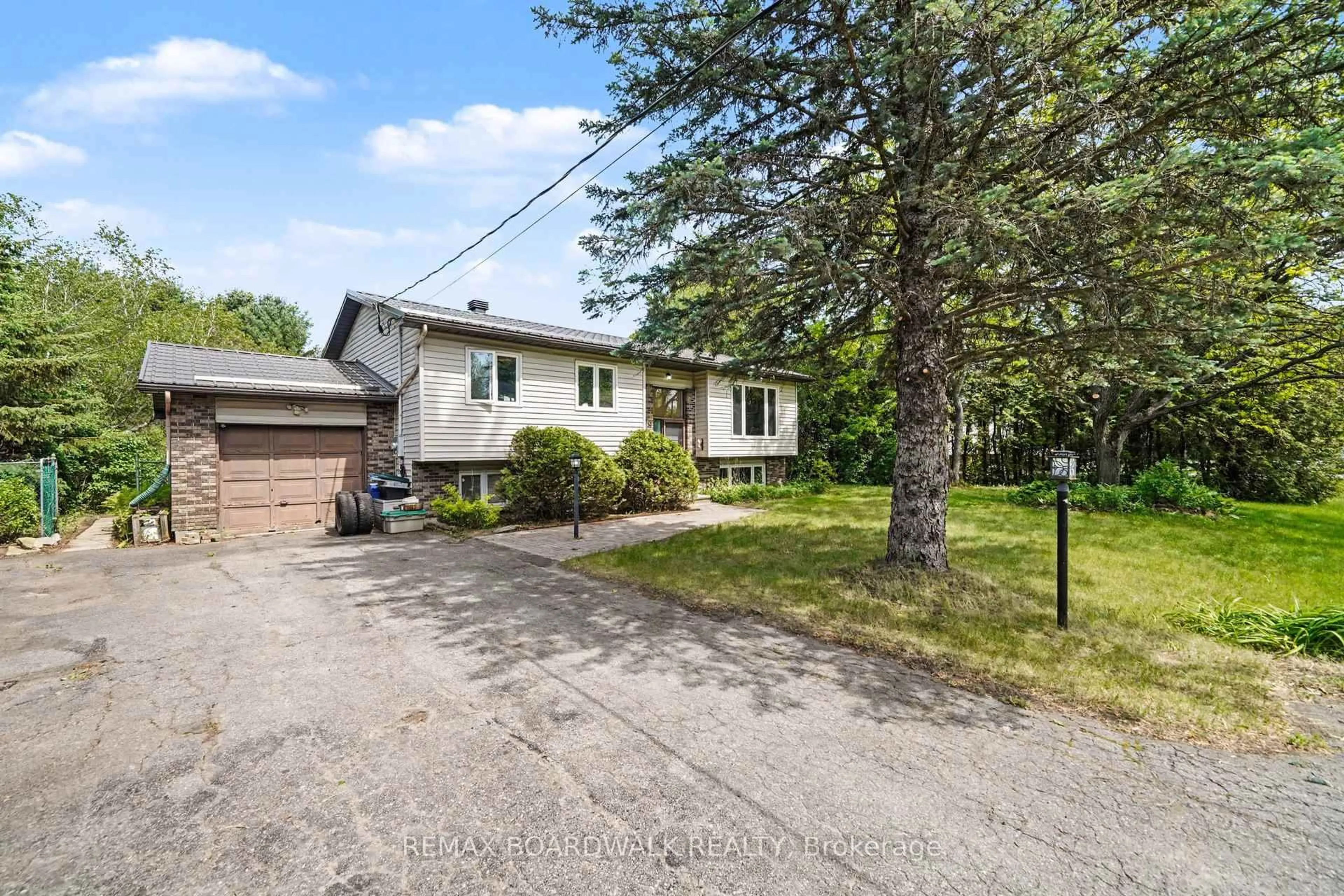 A pic from outside/outdoor area/front of a property/back of a property/a pic from drone, street for 3399 Regburn Dr, Osgoode Ontario K0A 2W0