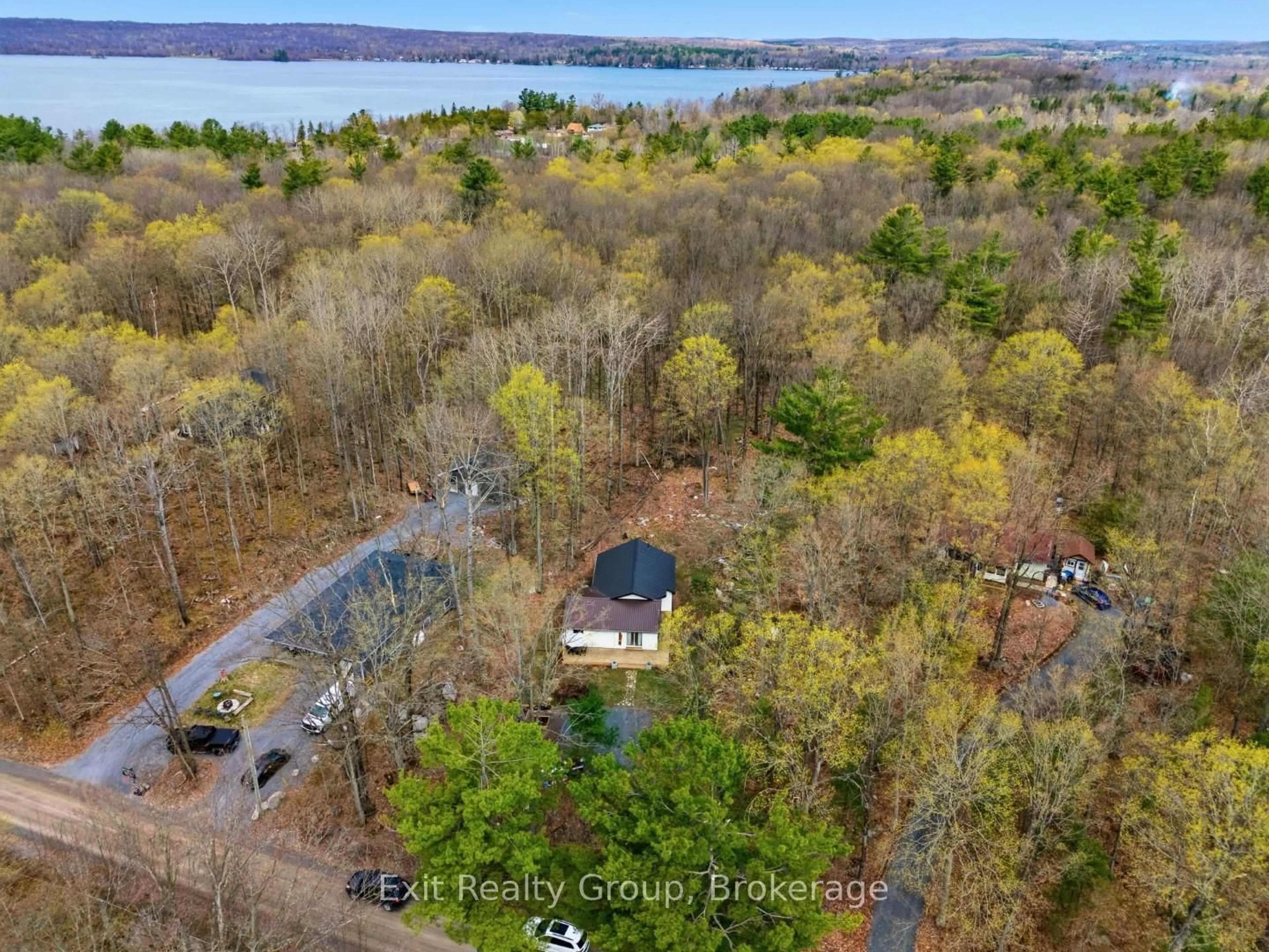A pic from outside/outdoor area/front of a property/back of a property/a pic from drone, water/lake/river/ocean view for 54 Paradise Rd, Limoges Ontario K0K 2M0