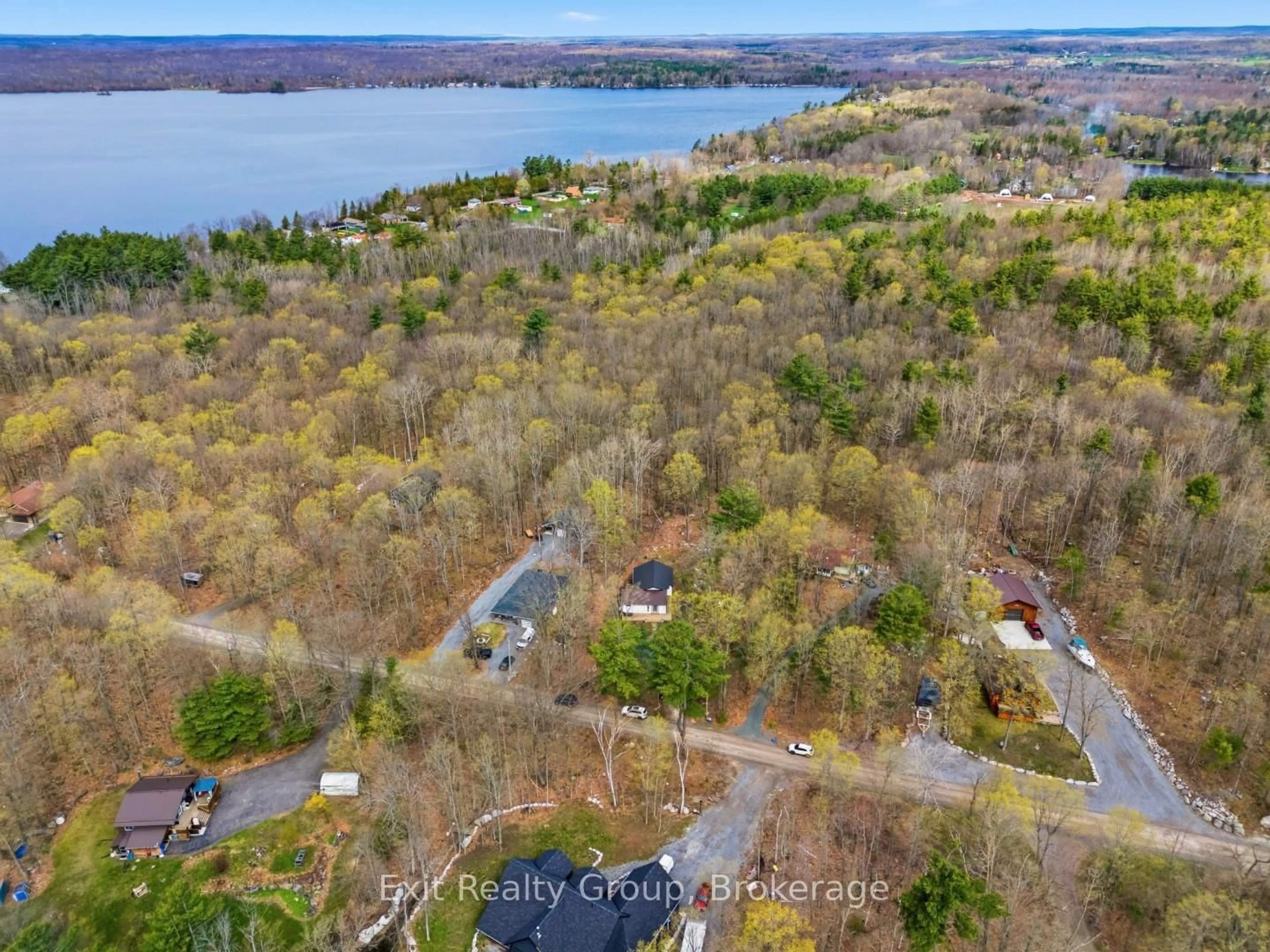 A pic from outside/outdoor area/front of a property/back of a property/a pic from drone, water/lake/river/ocean view for 54 Paradise Rd, Limoges Ontario K0K 2M0