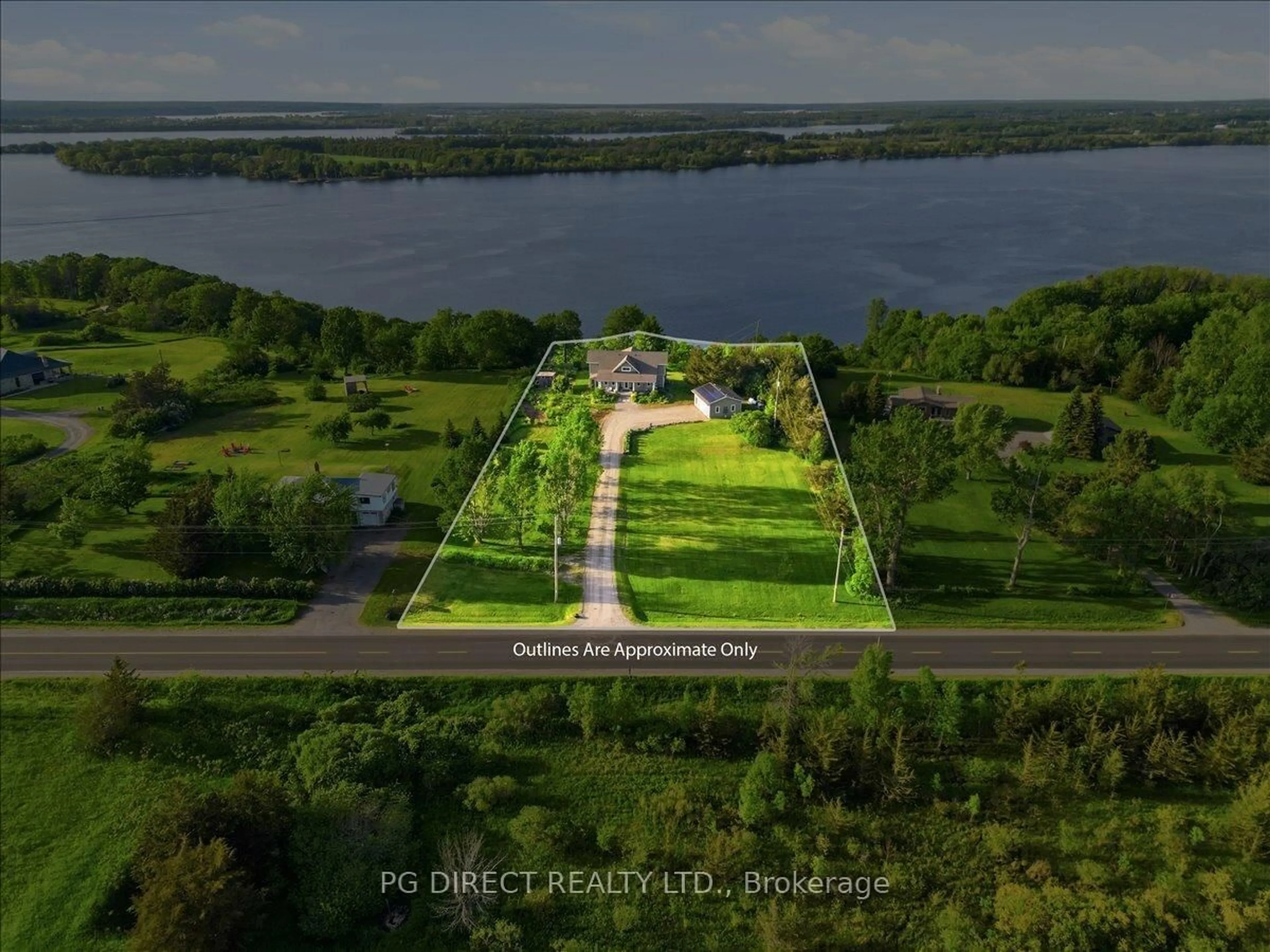 A pic from outside/outdoor area/front of a property/back of a property/a pic from drone, water/lake/river/ocean view for 493 County Road 7 Rd, Prince Edward County Ontario K0K 2T0