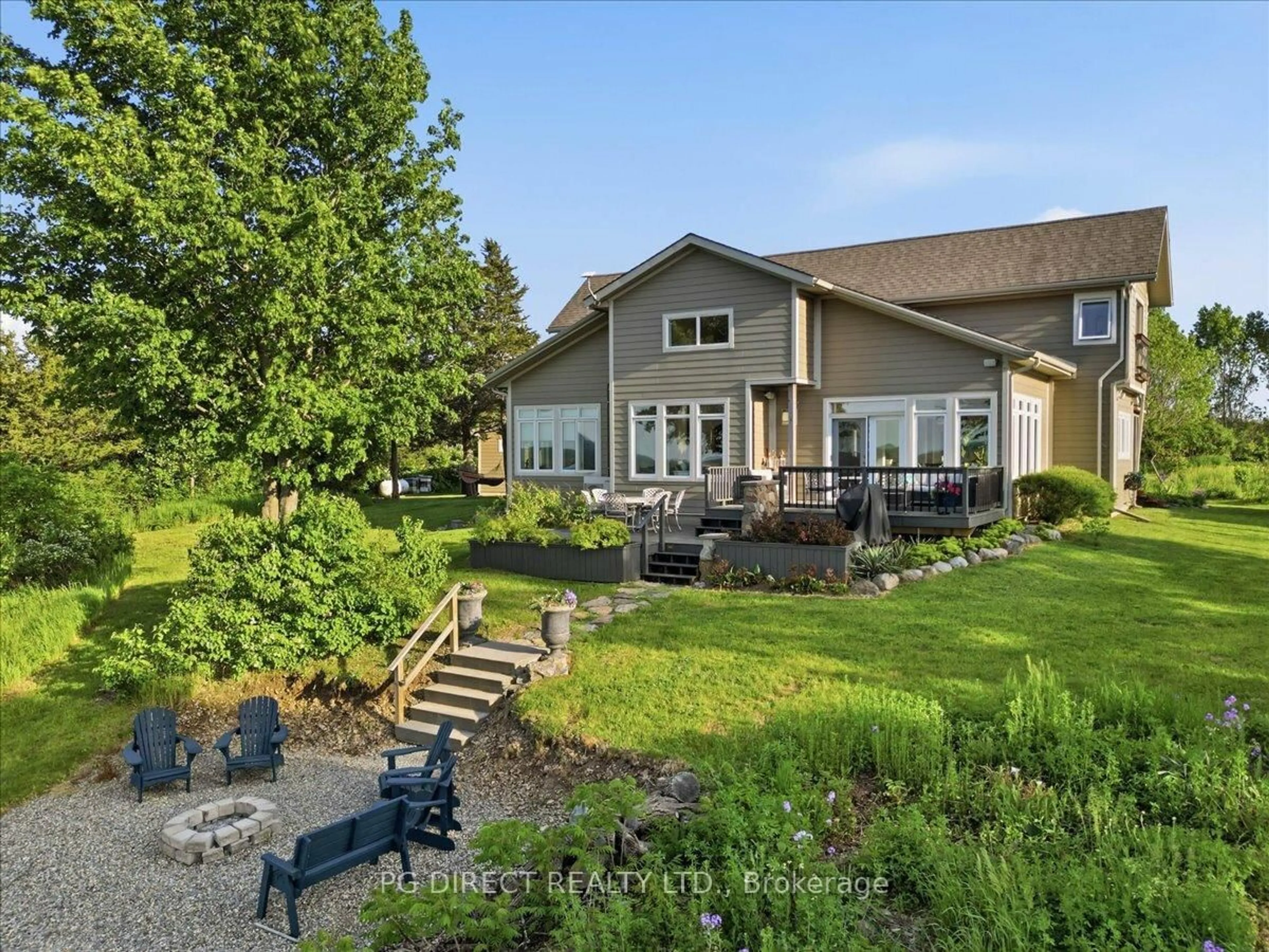 A pic from outside/outdoor area/front of a property/back of a property/a pic from drone, water/lake/river/ocean view for 493 County Road 7 Rd, Prince Edward County Ontario K0K 2T0