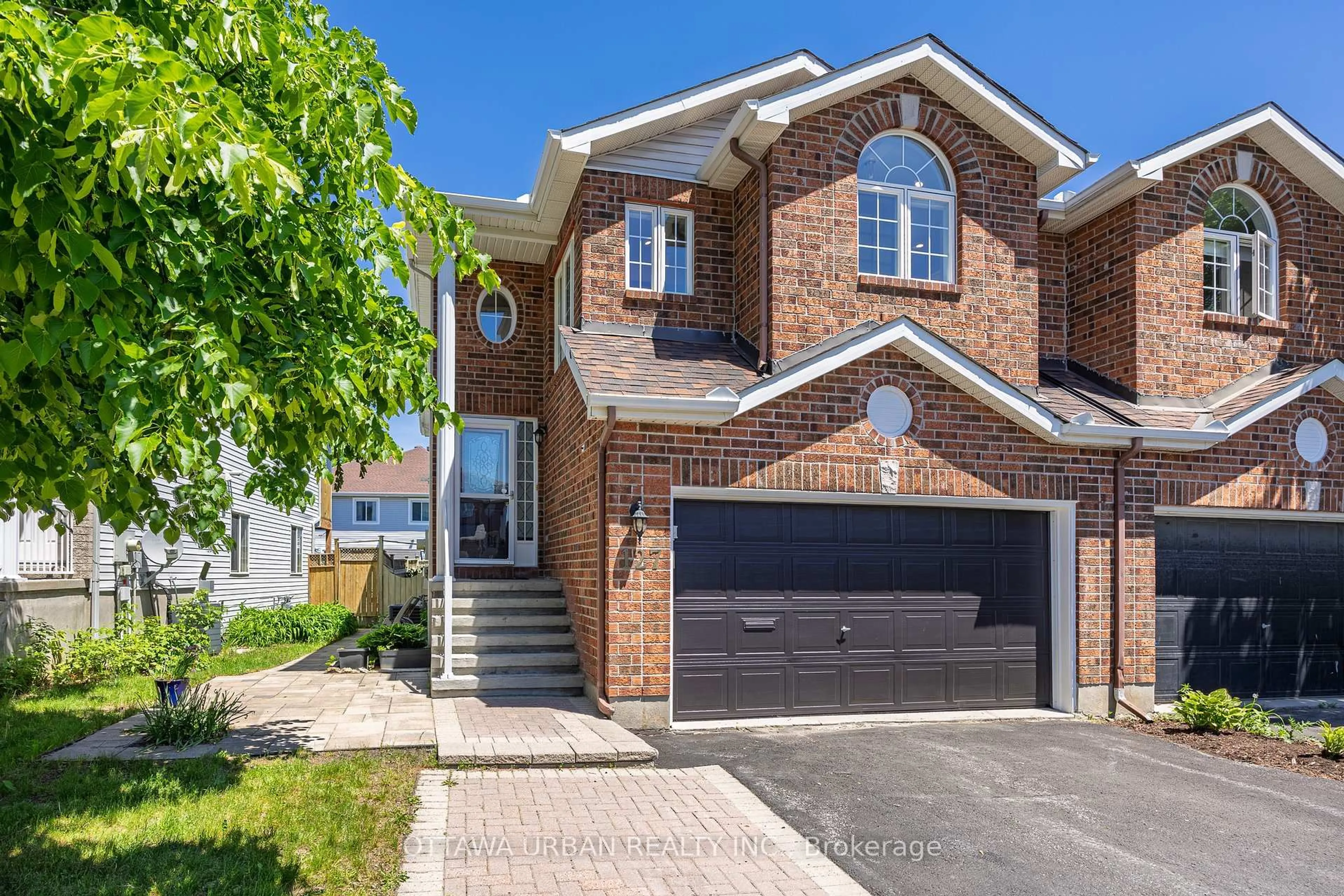 Home with brick exterior material, street for 127 Castle Glen Cres, Ottawa Ontario K2L 4G9