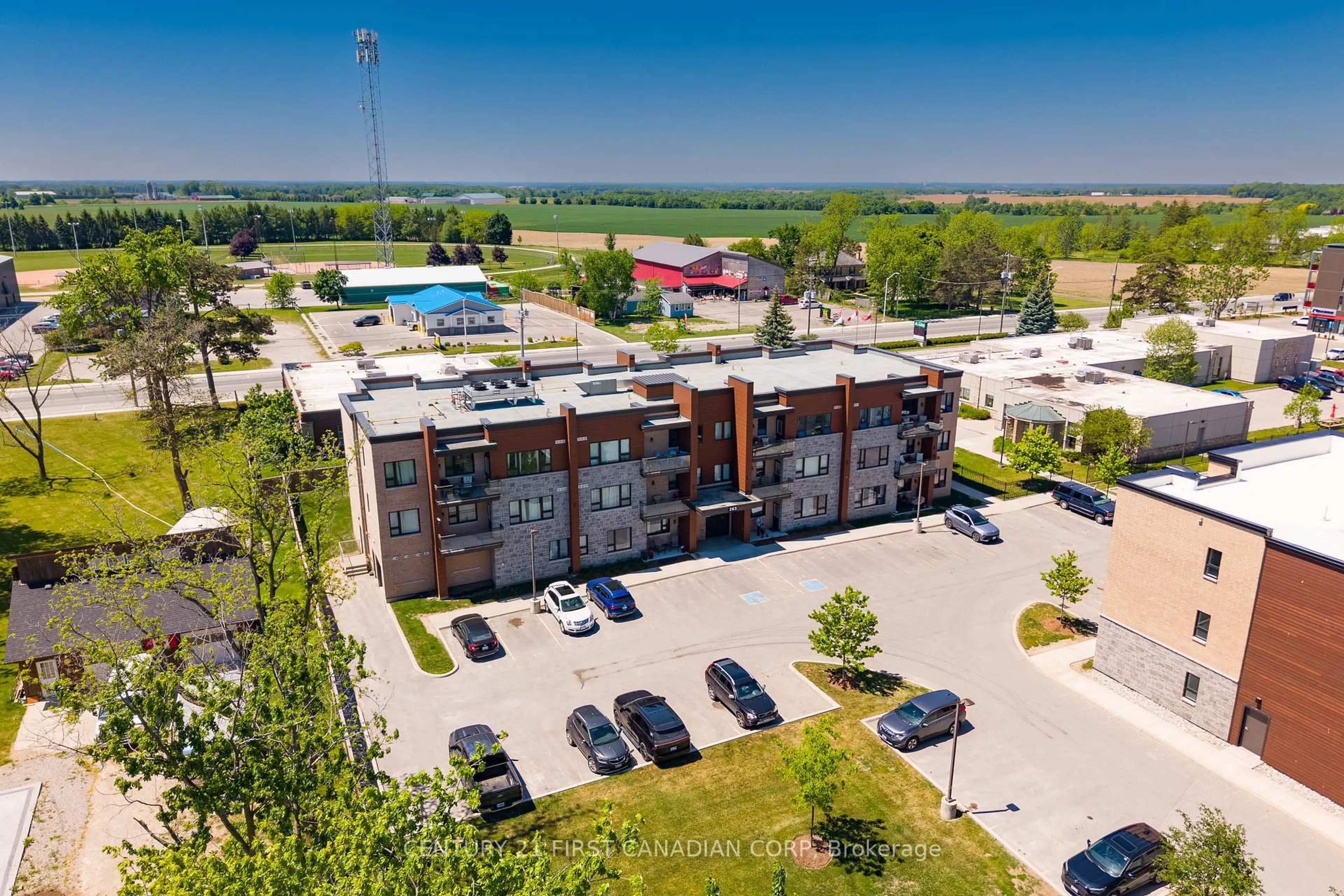 A pic from outside/outdoor area/front of a property/back of a property/a pic from drone, building for 263 Butler St #104, Lucan Biddulph Ontario N0M 2J0