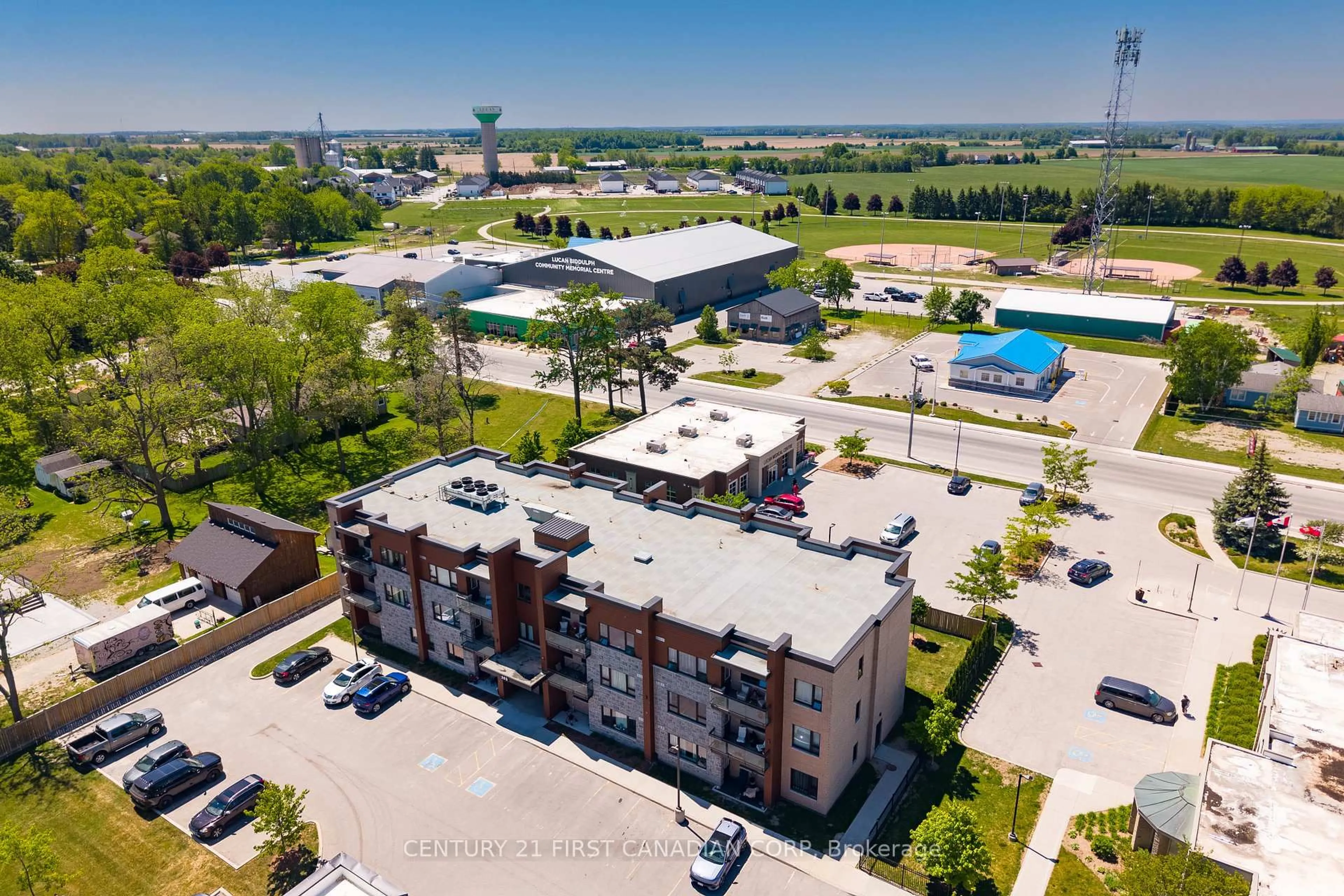 A pic from outside/outdoor area/front of a property/back of a property/a pic from drone, unknown for 263 Butler St #104, Lucan Biddulph Ontario N0M 2J0