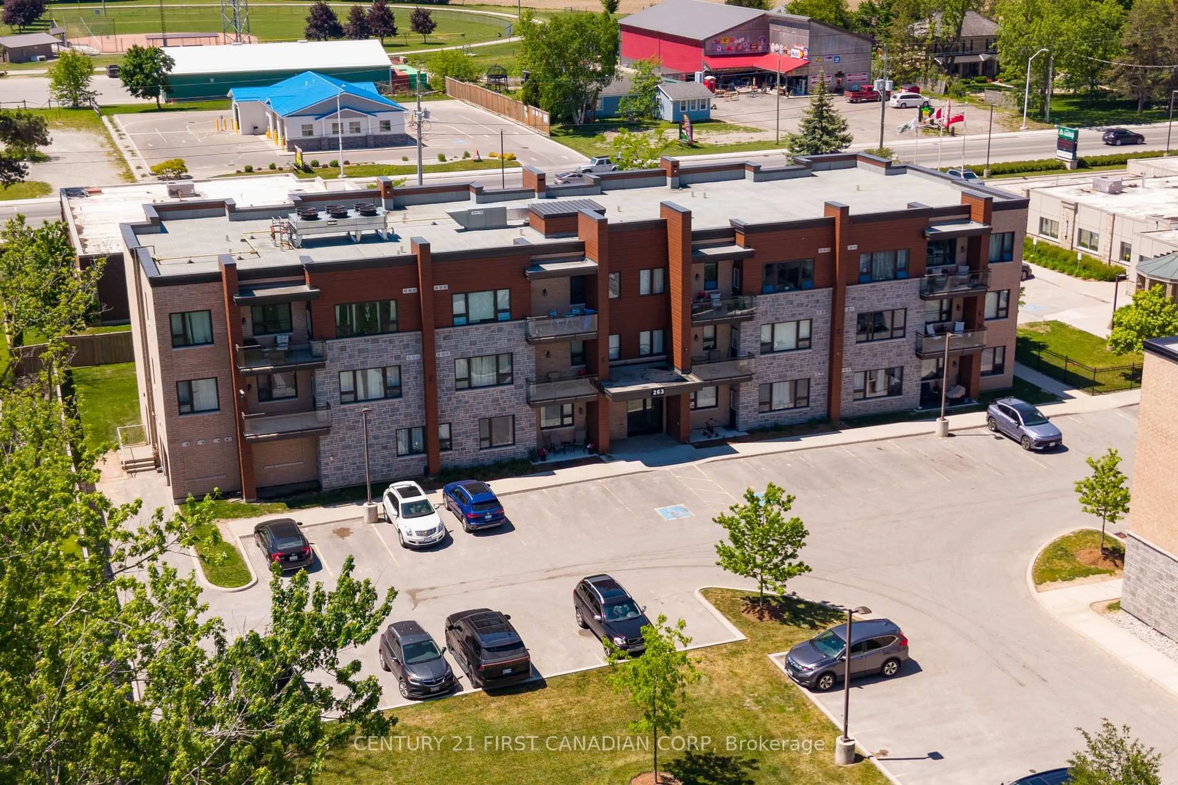 A pic from outside/outdoor area/front of a property/back of a property/a pic from drone, building for 263 Butler St #104, Lucan Biddulph Ontario N0M 2J0