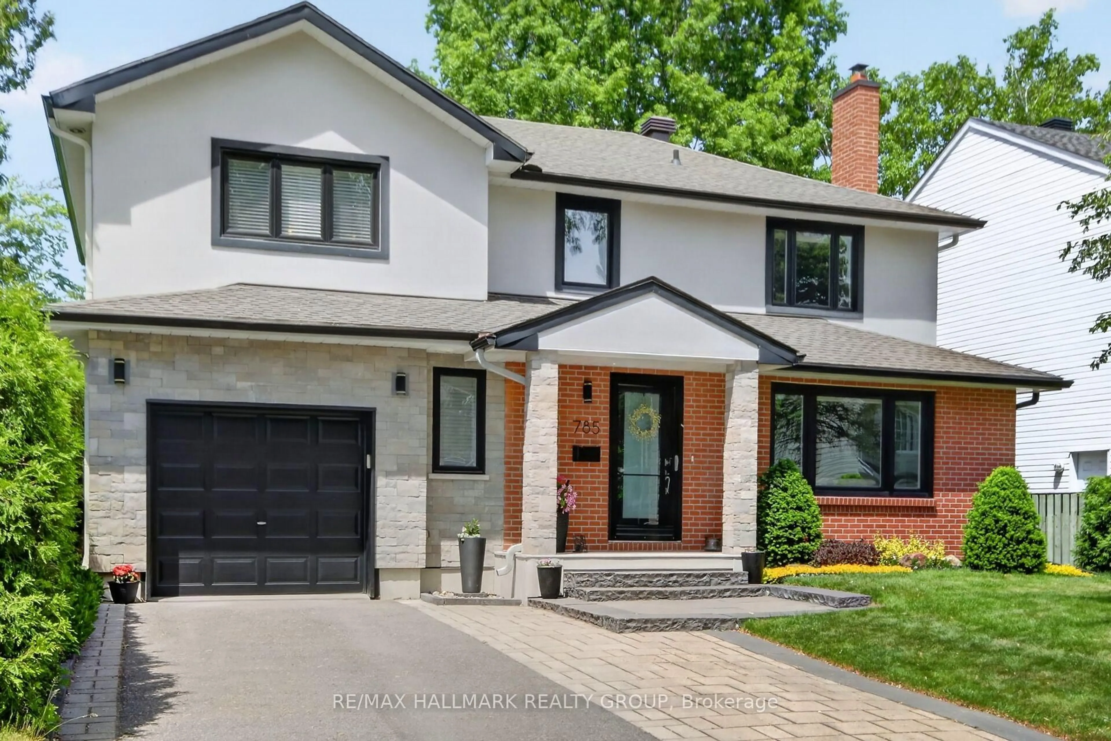 Home with brick exterior material, street for 785 Dunloe Ave, Ottawa Ontario K1K 0K3