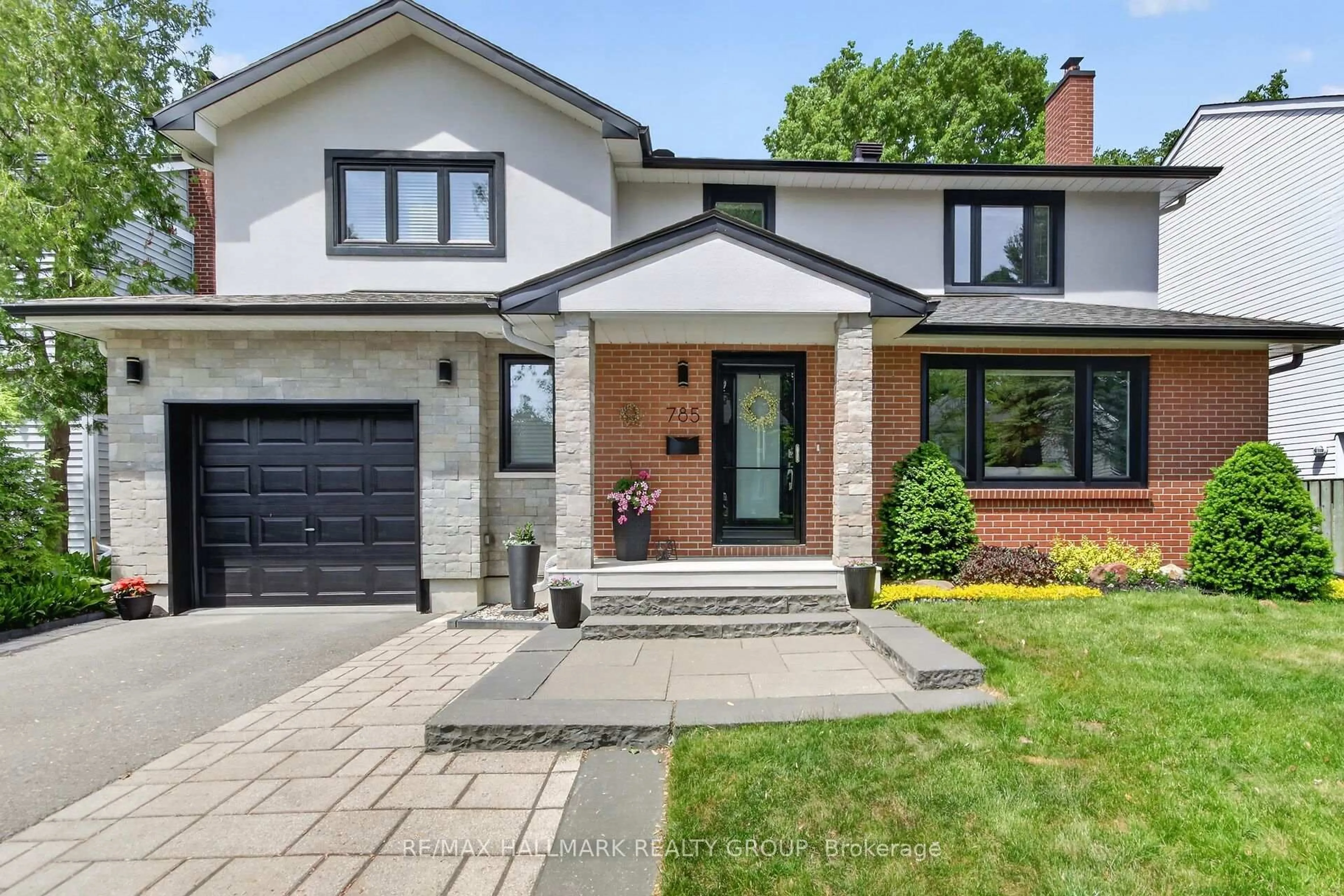 Home with brick exterior material, street for 785 Dunloe Ave, Ottawa Ontario K1K 0K3