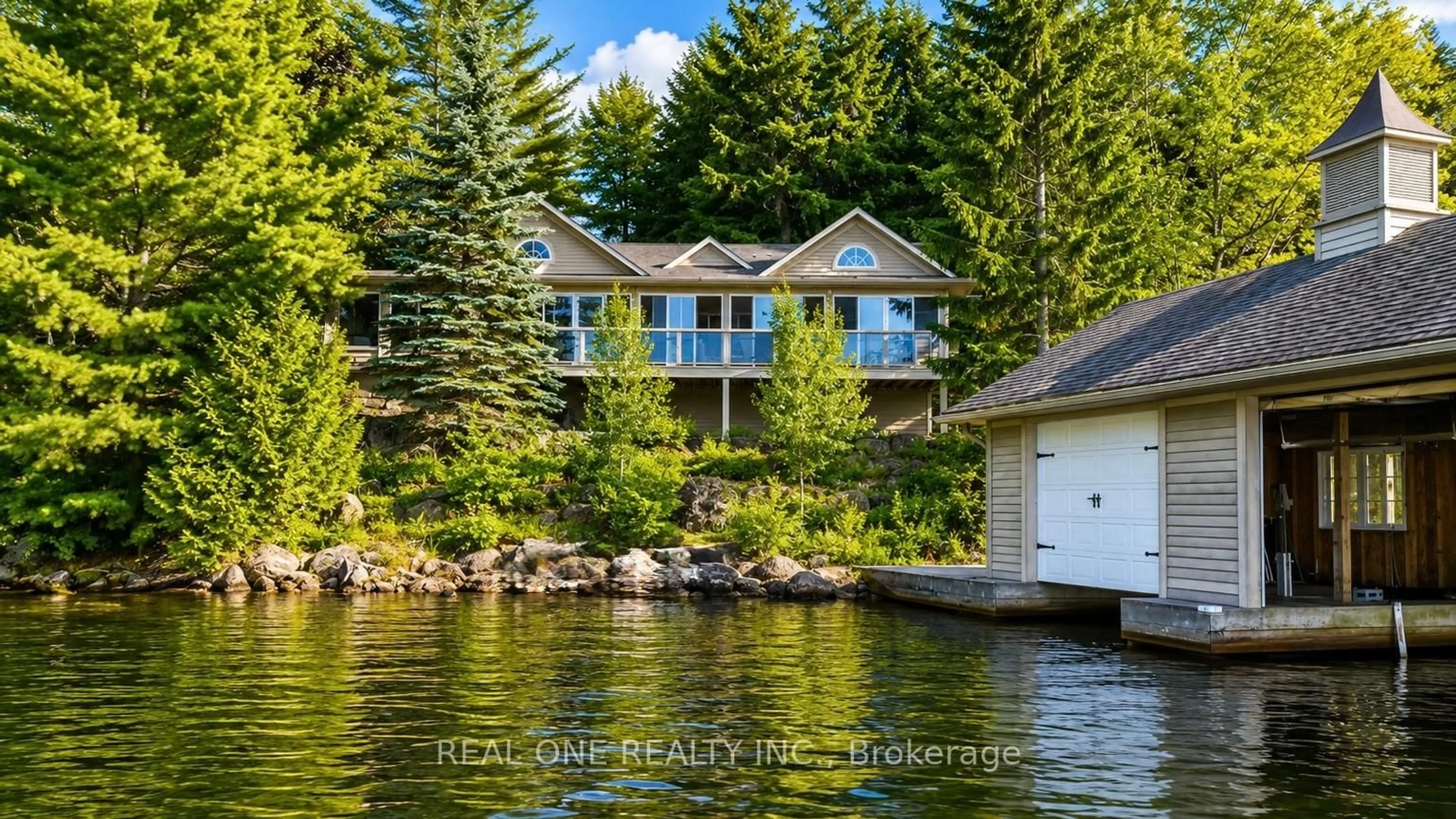 A pic from outside/outdoor area/front of a property/back of a property/a pic from drone, water/lake/river/ocean view for 3013 MUSKOKA ROAD 117, Lake of Bays Ontario P0B 1A0