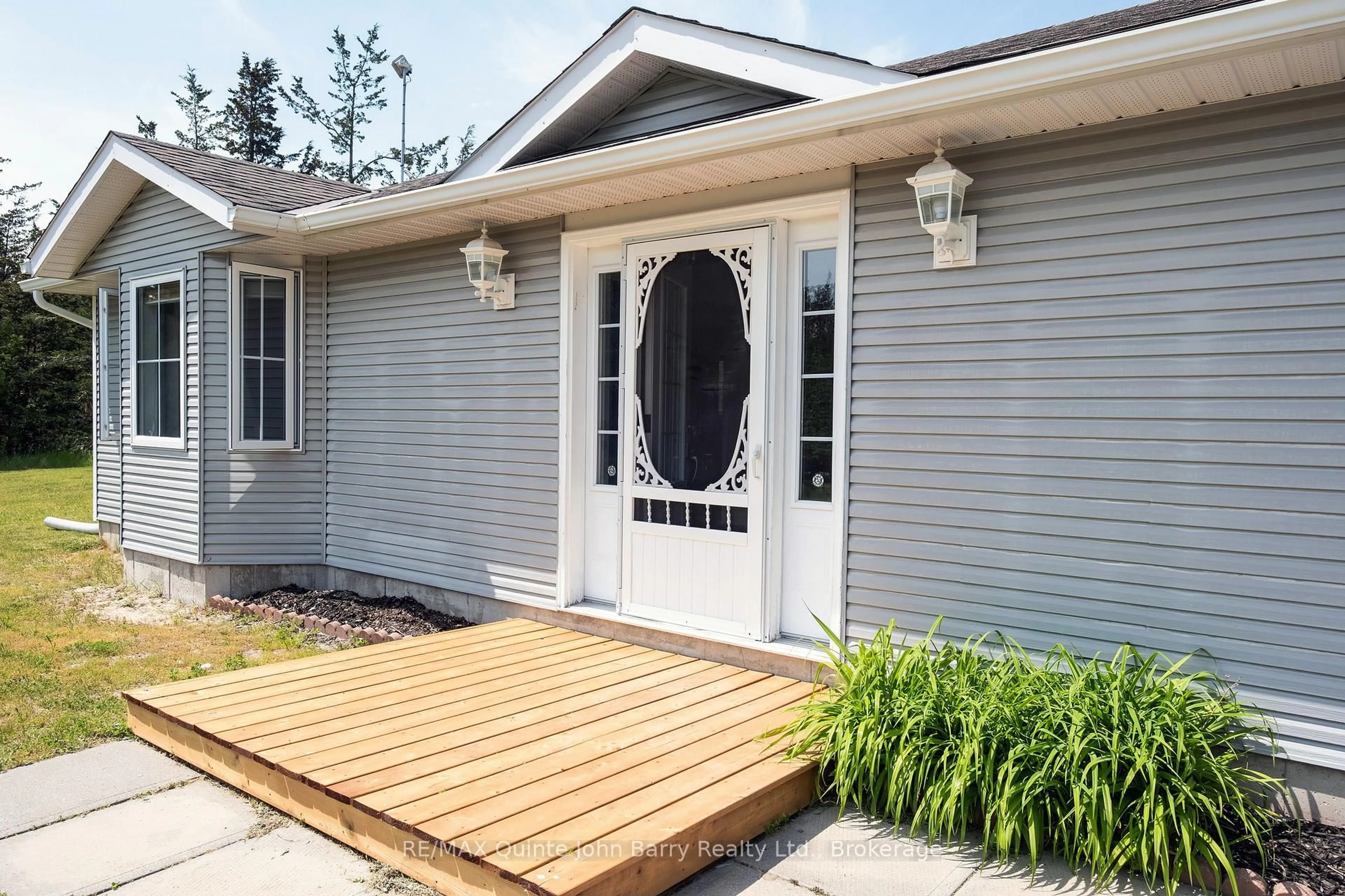 Home with vinyl exterior material, street for 3249 Harmony Rd, Shannonville Ontario K0K 3A0